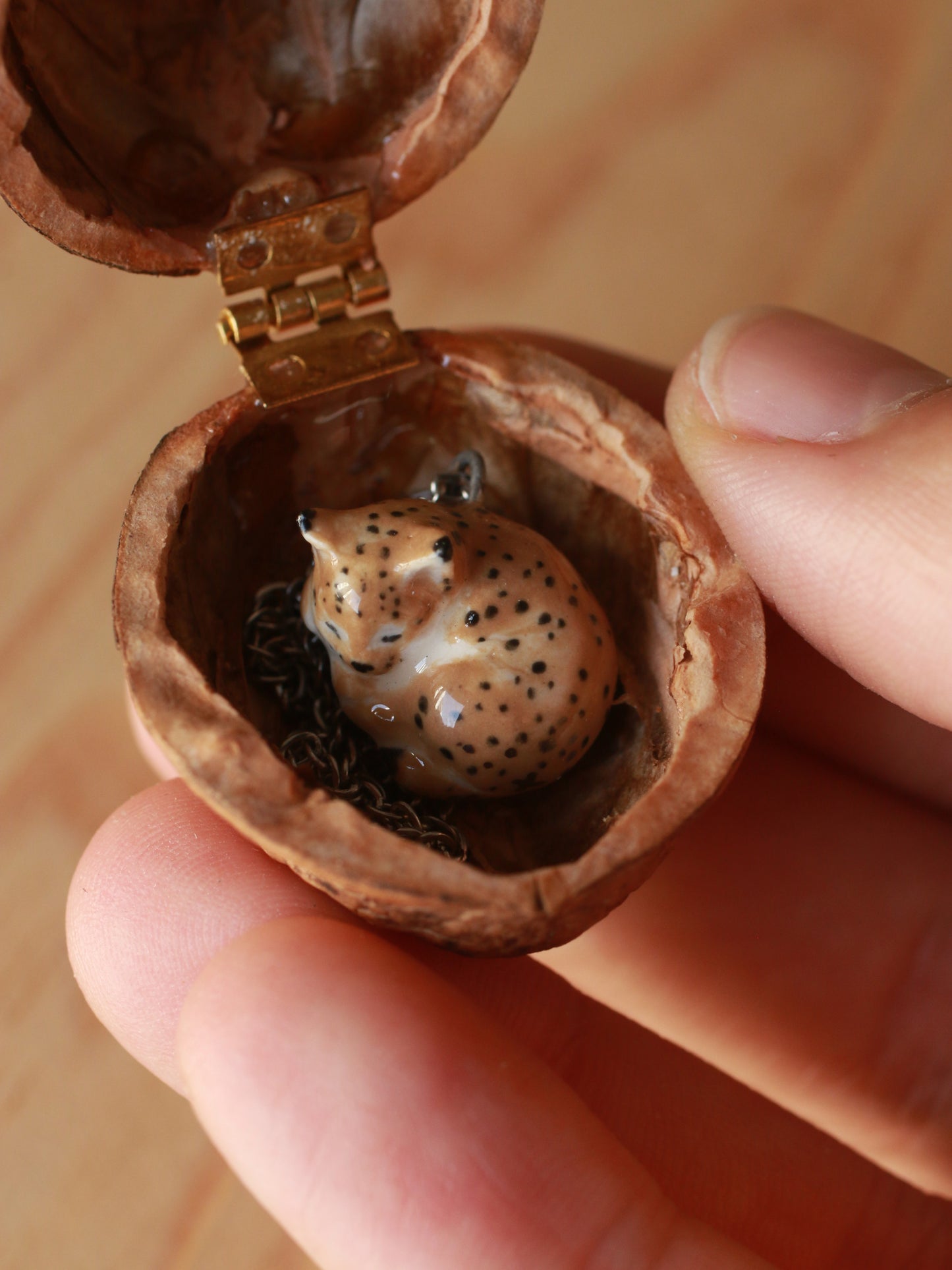 Sleeping Lynx necklace in a walnut box