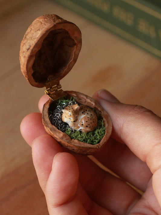 Sleeping Lynx necklace in a walnut box