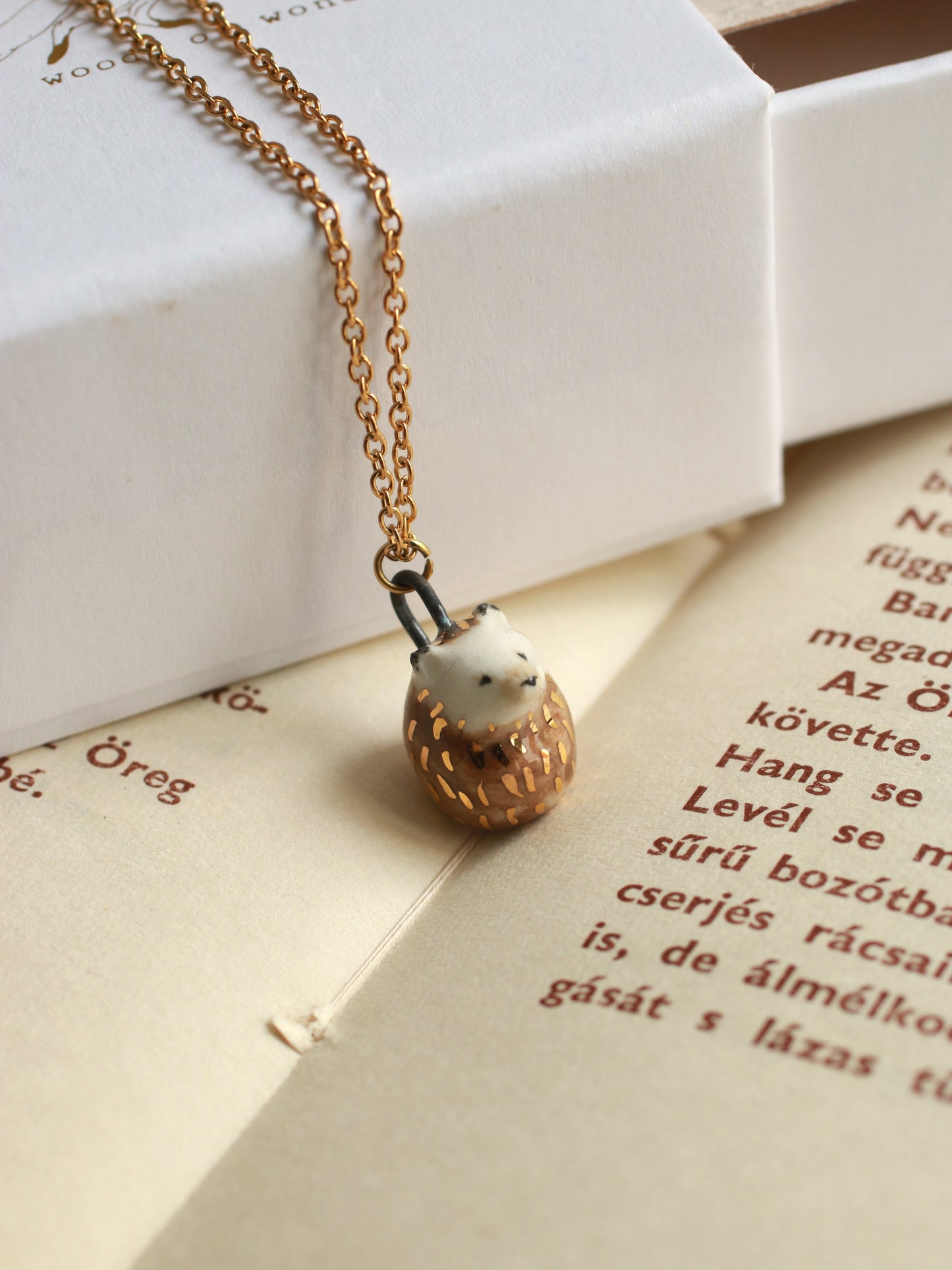 Ceramic Hedgehog necklace in a walnut box - 22k gold details
