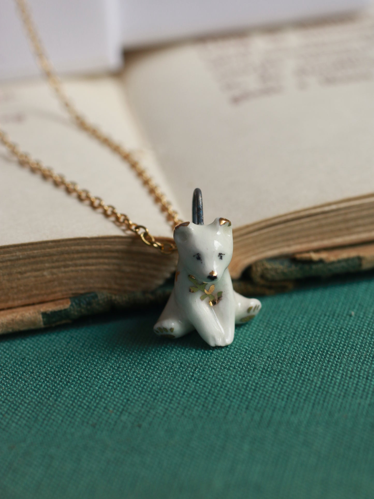 Ceramic bear necklace in a walnut box - 22k gold details
