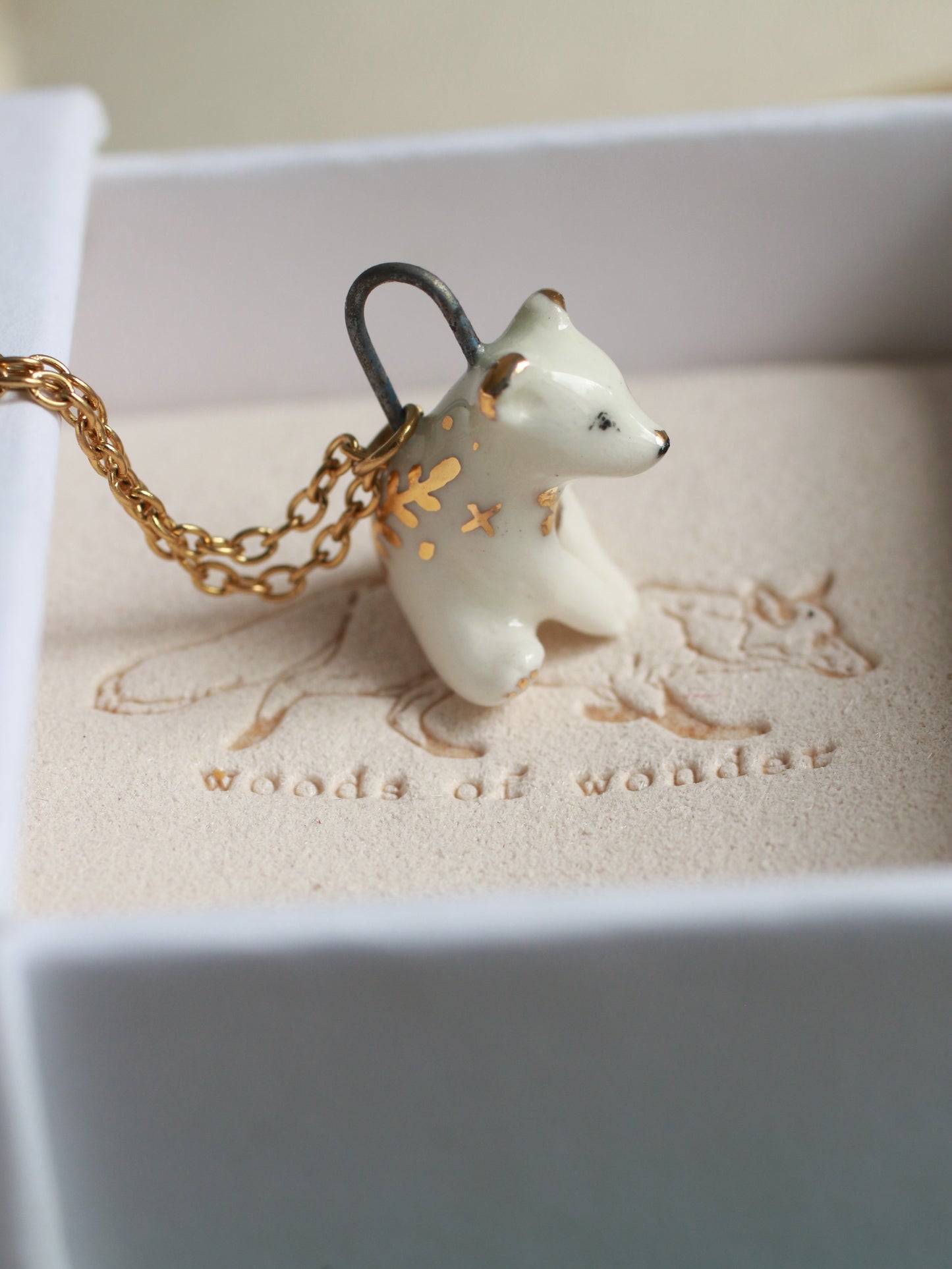 Ceramic bear necklace in a walnut box - 22k gold details