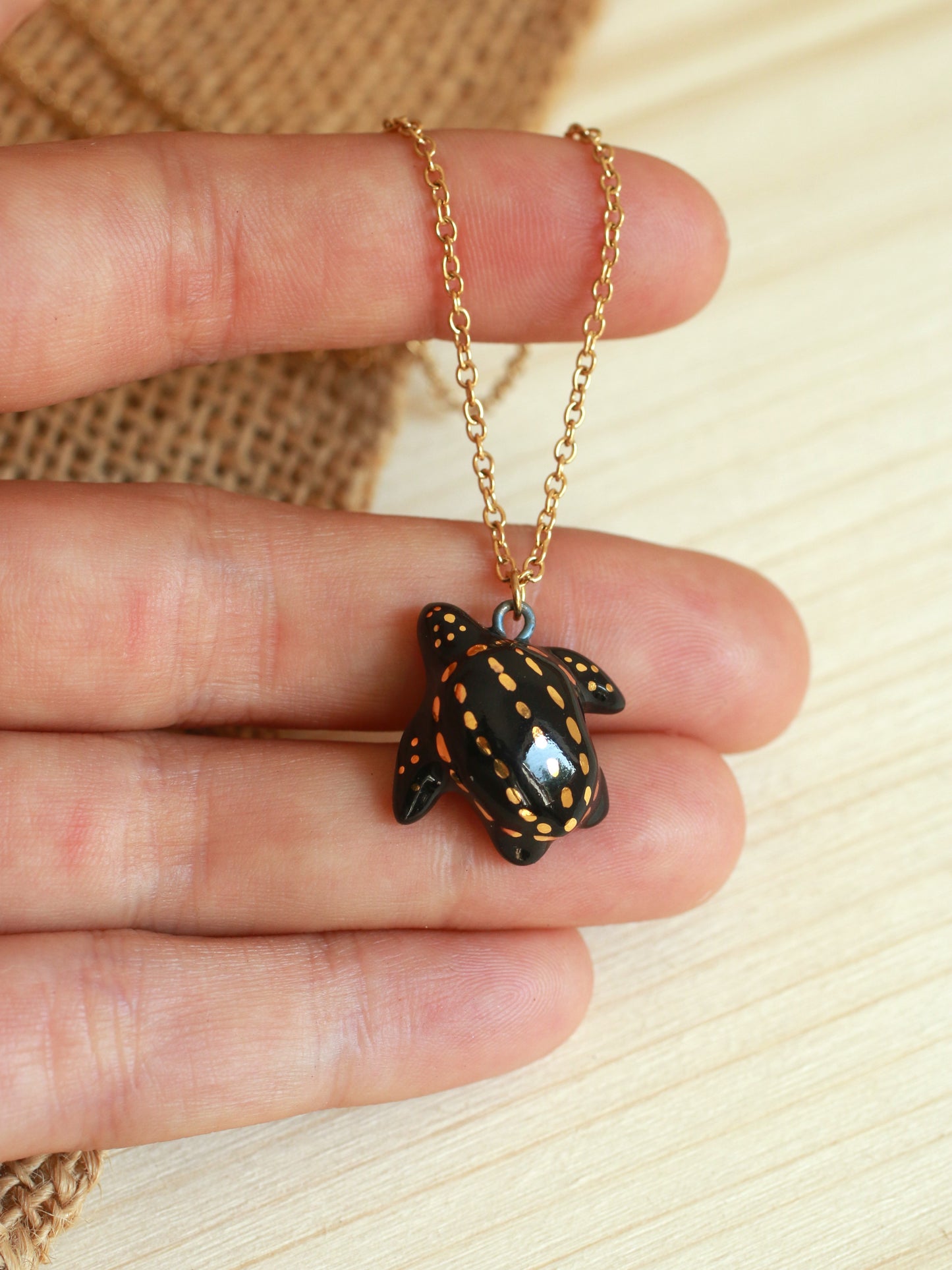 Ceramic black sea turtle necklace - with 22k gold details