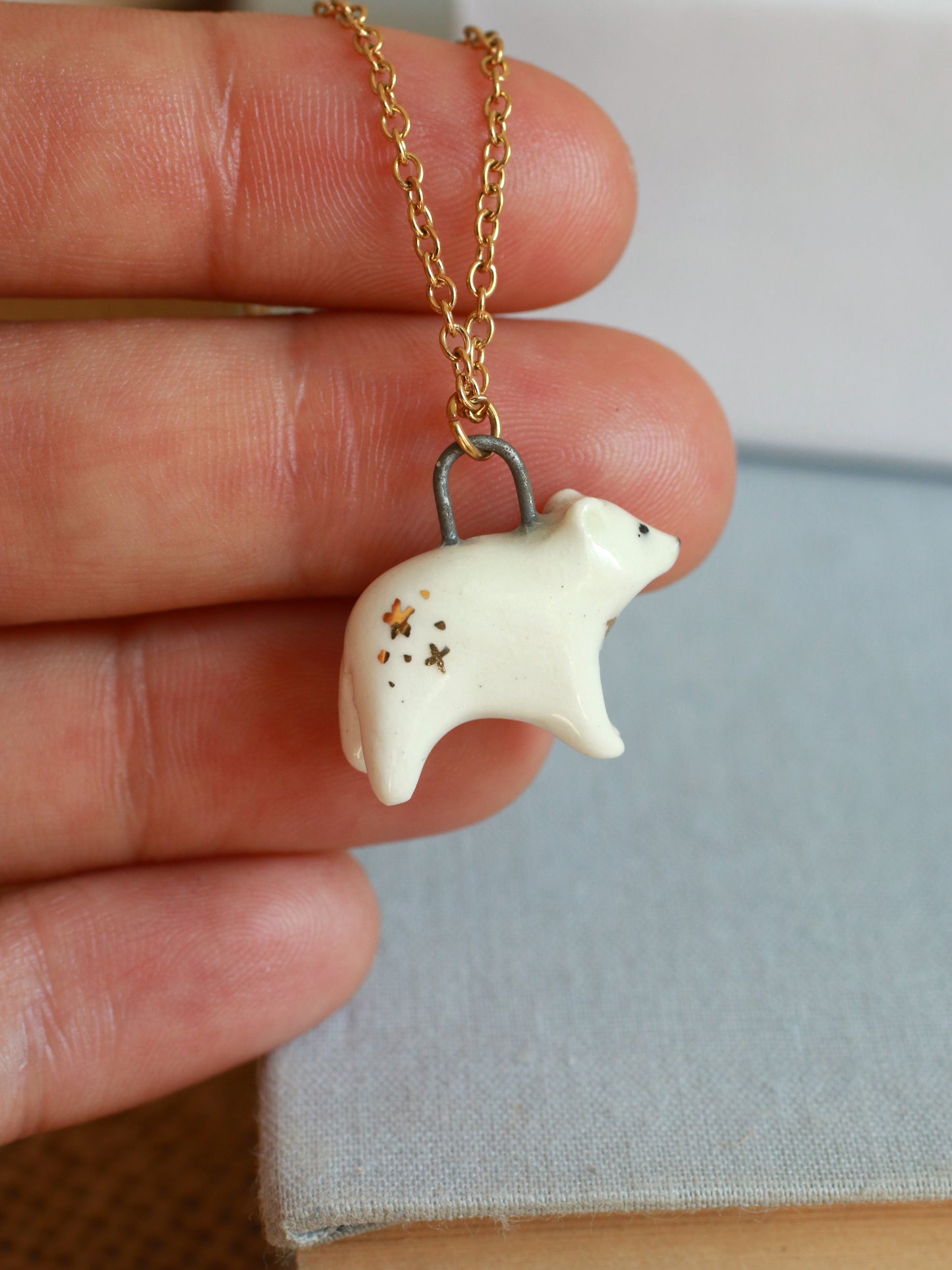 Ceramic polar bear necklace - with 22k gold details