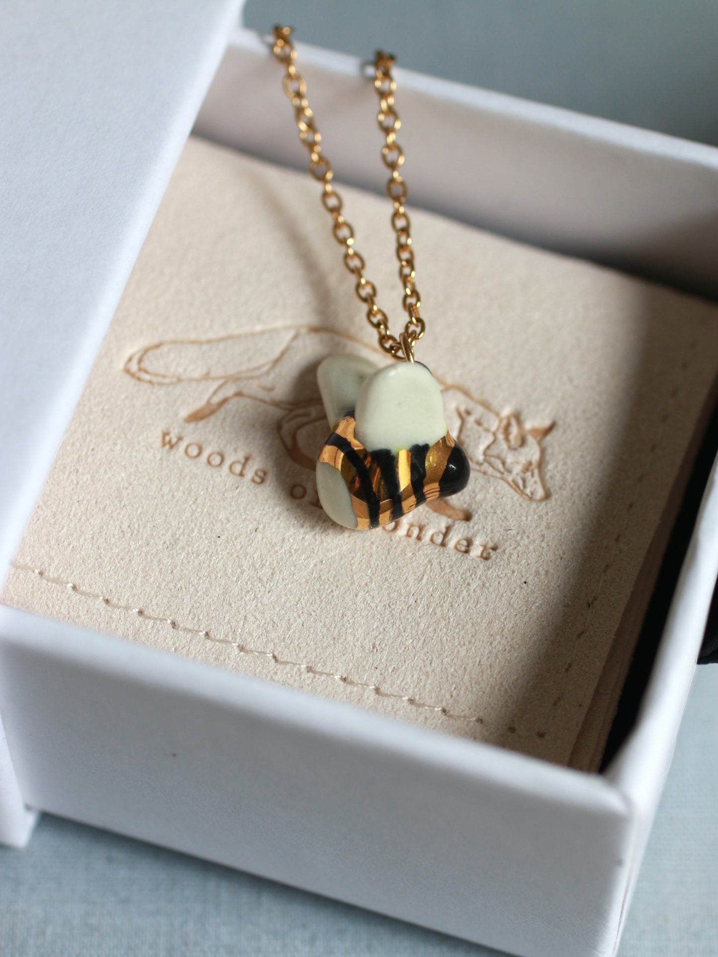 Ceramic bee necklace - 22k gold details