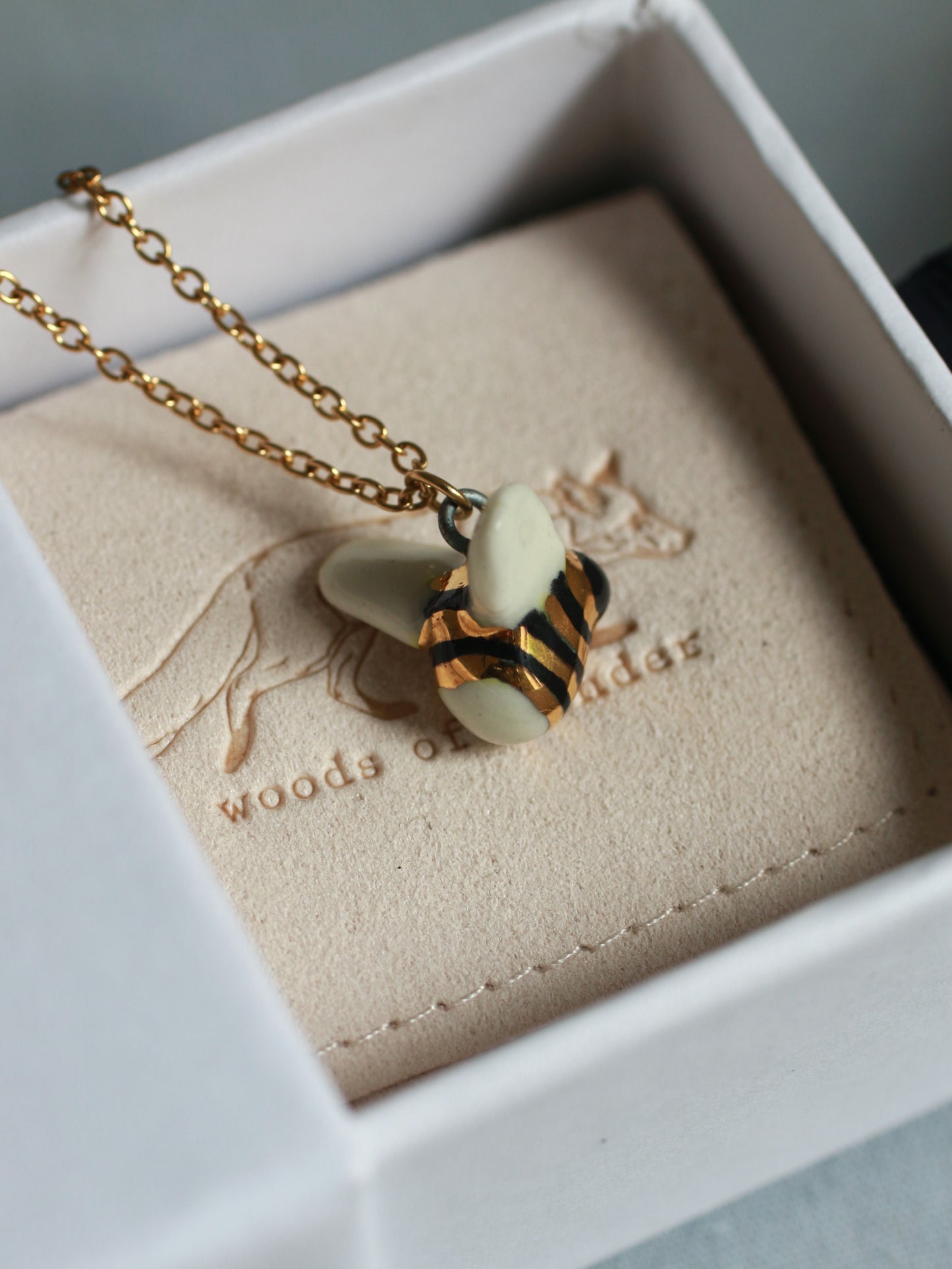 Ceramic bee necklace - 22k gold details