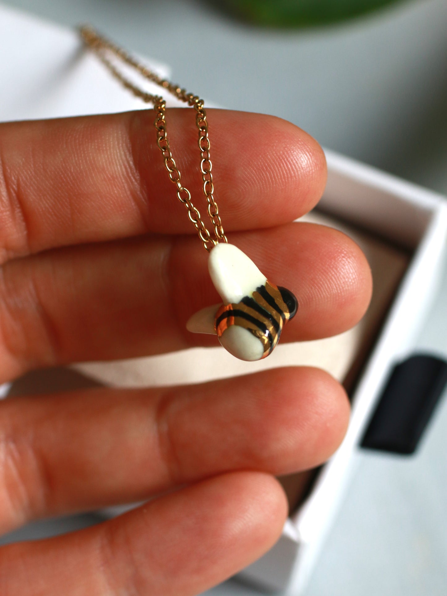 Ceramic bee necklace - 22k gold details