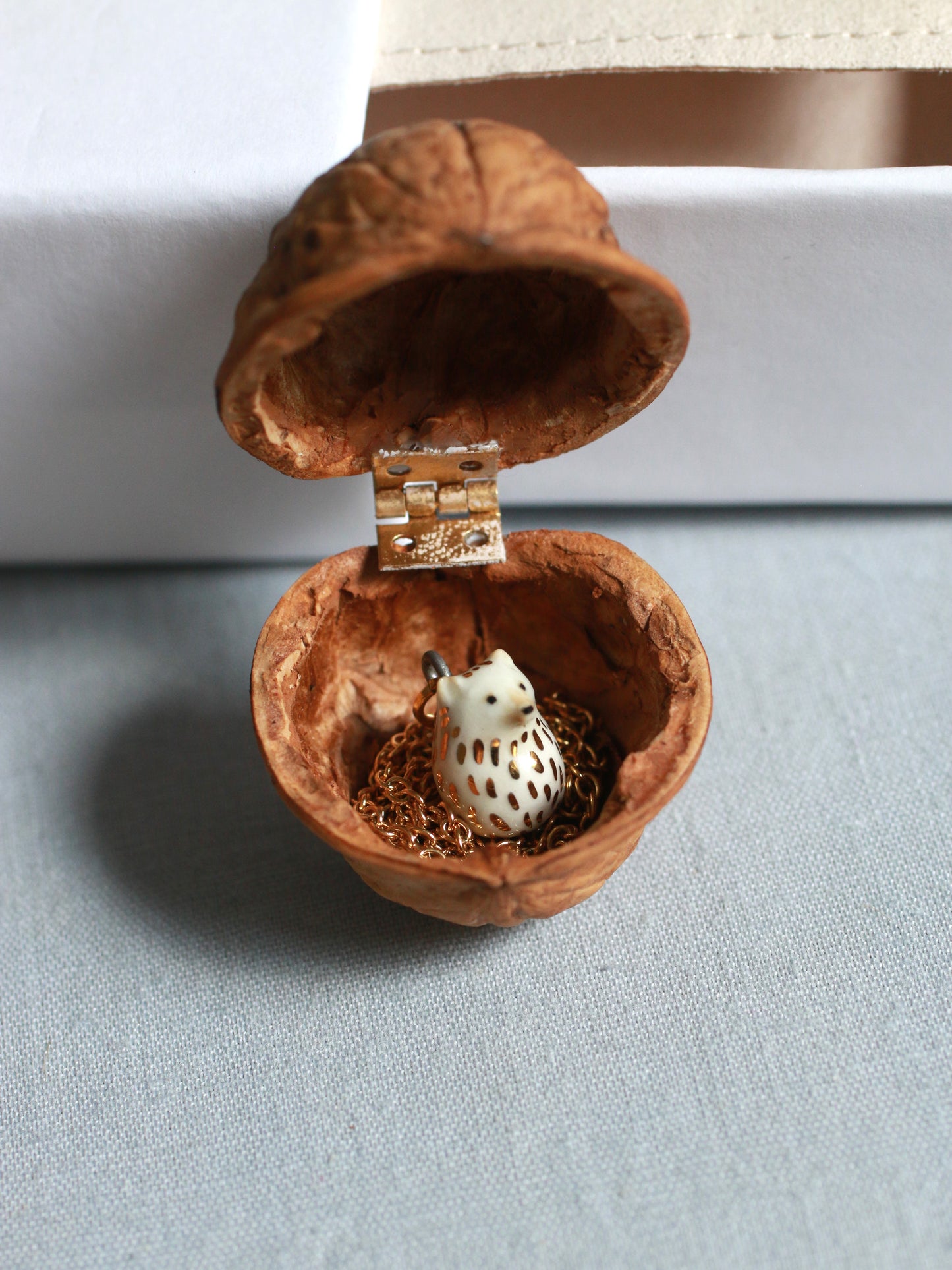 Ceramic Hedgehog necklace in a walnut box - 22k gold details