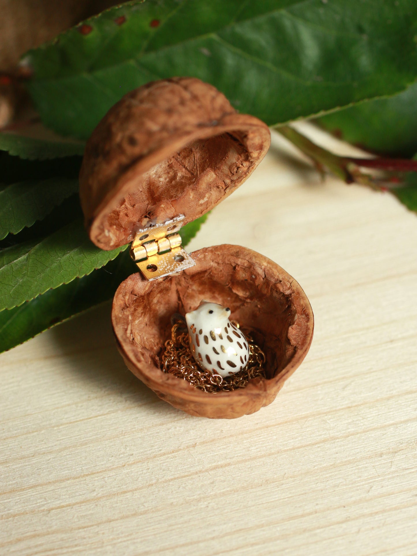 Ceramic Hedgehog necklace in a walnut box - 22k gold details