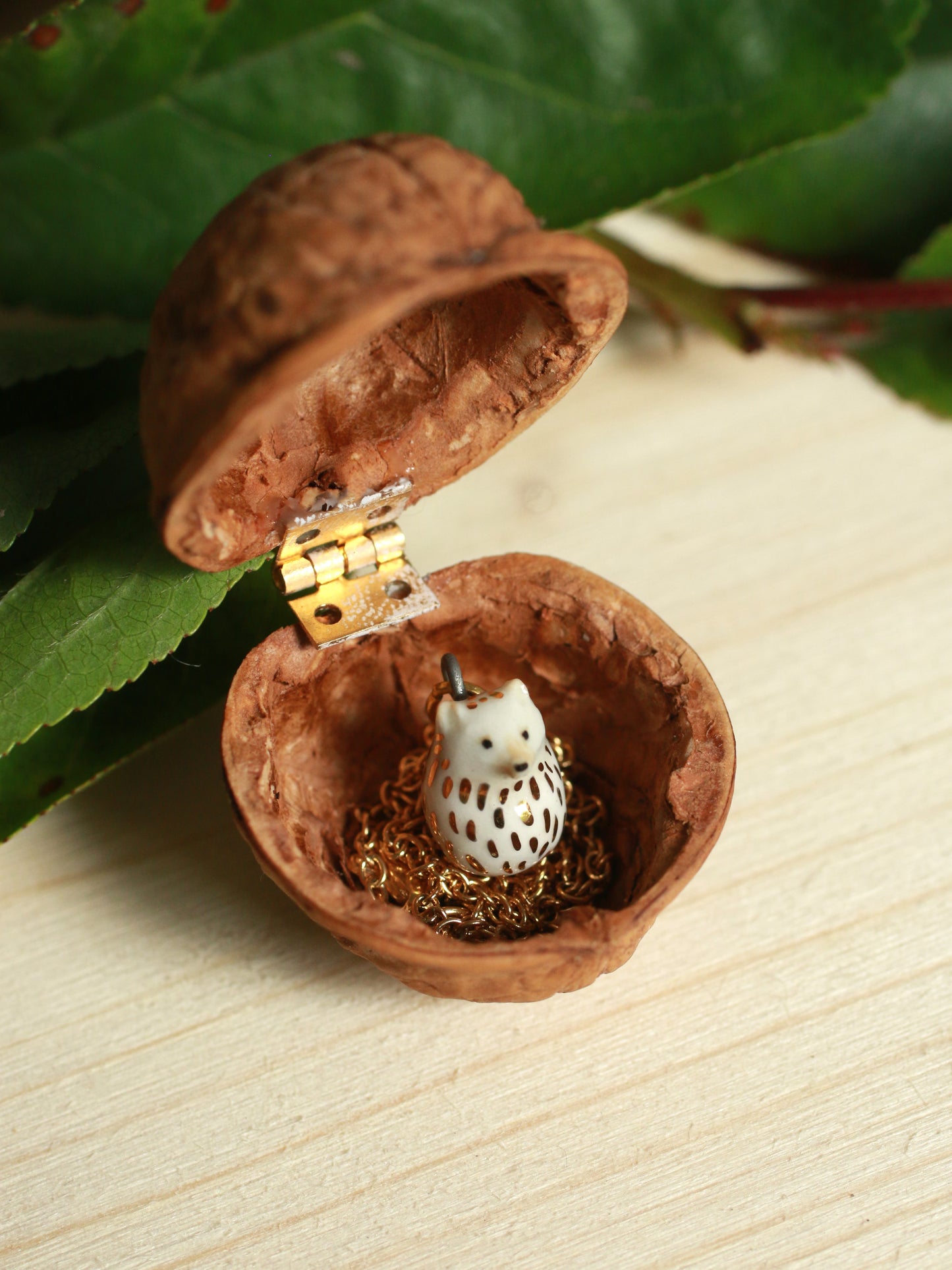 Ceramic Hedgehog necklace in a walnut box - 22k gold details