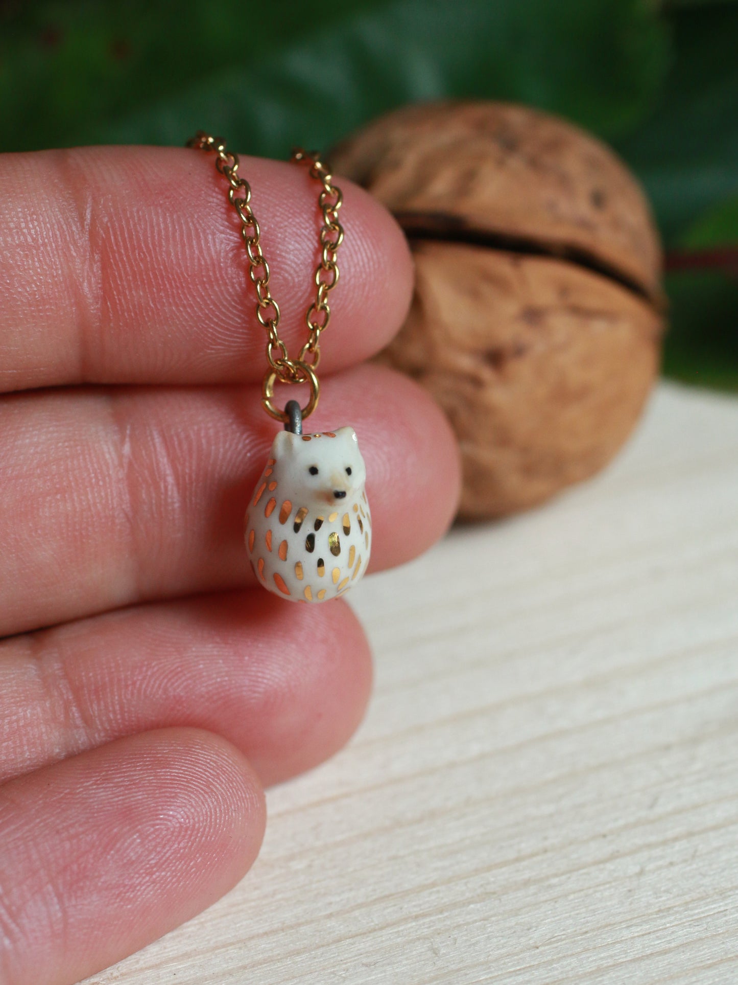 Ceramic Hedgehog necklace in a walnut box - 22k gold details