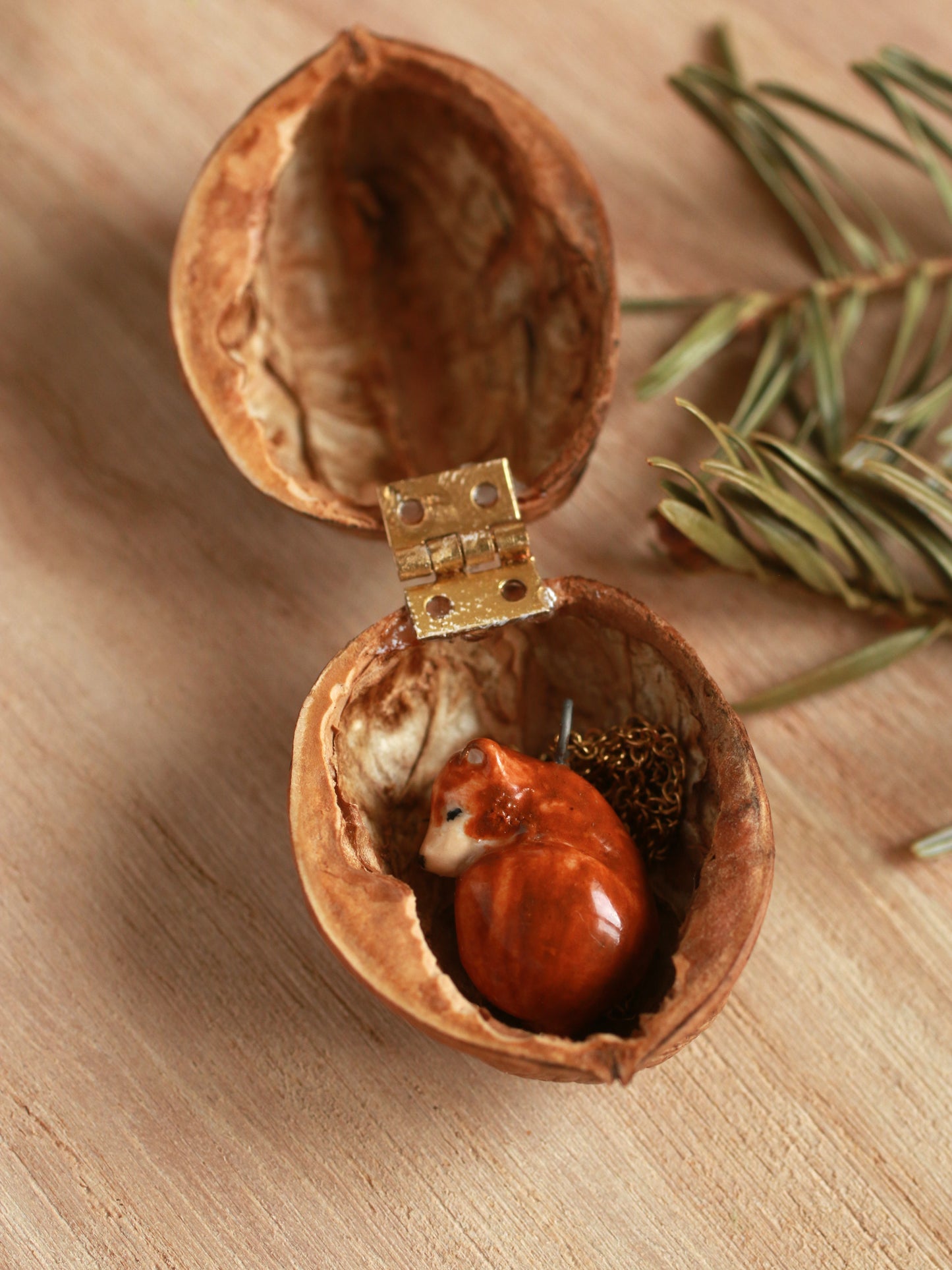 Sleeping bear necklace in a walnut box