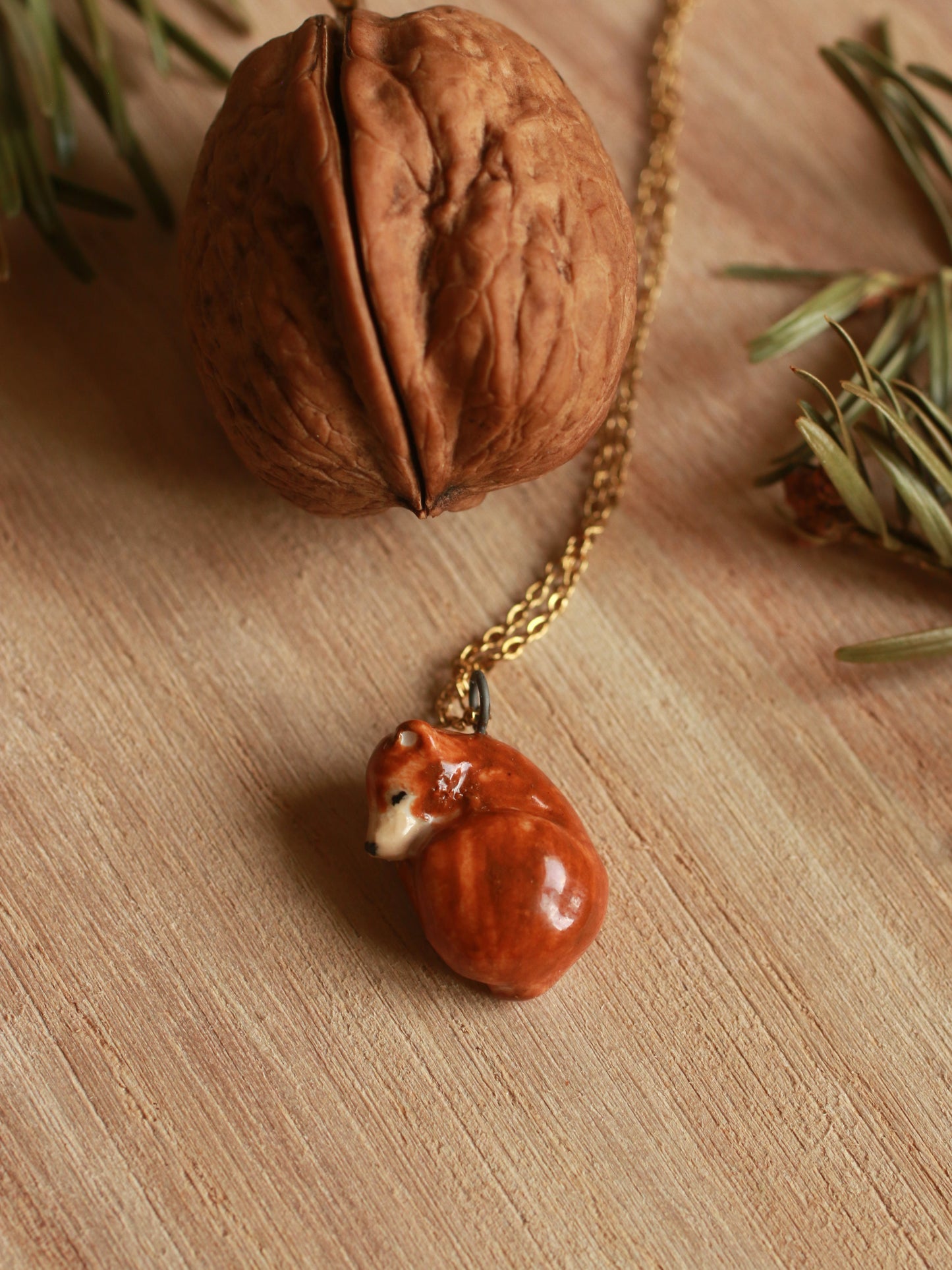 Sleeping bear necklace in a walnut box