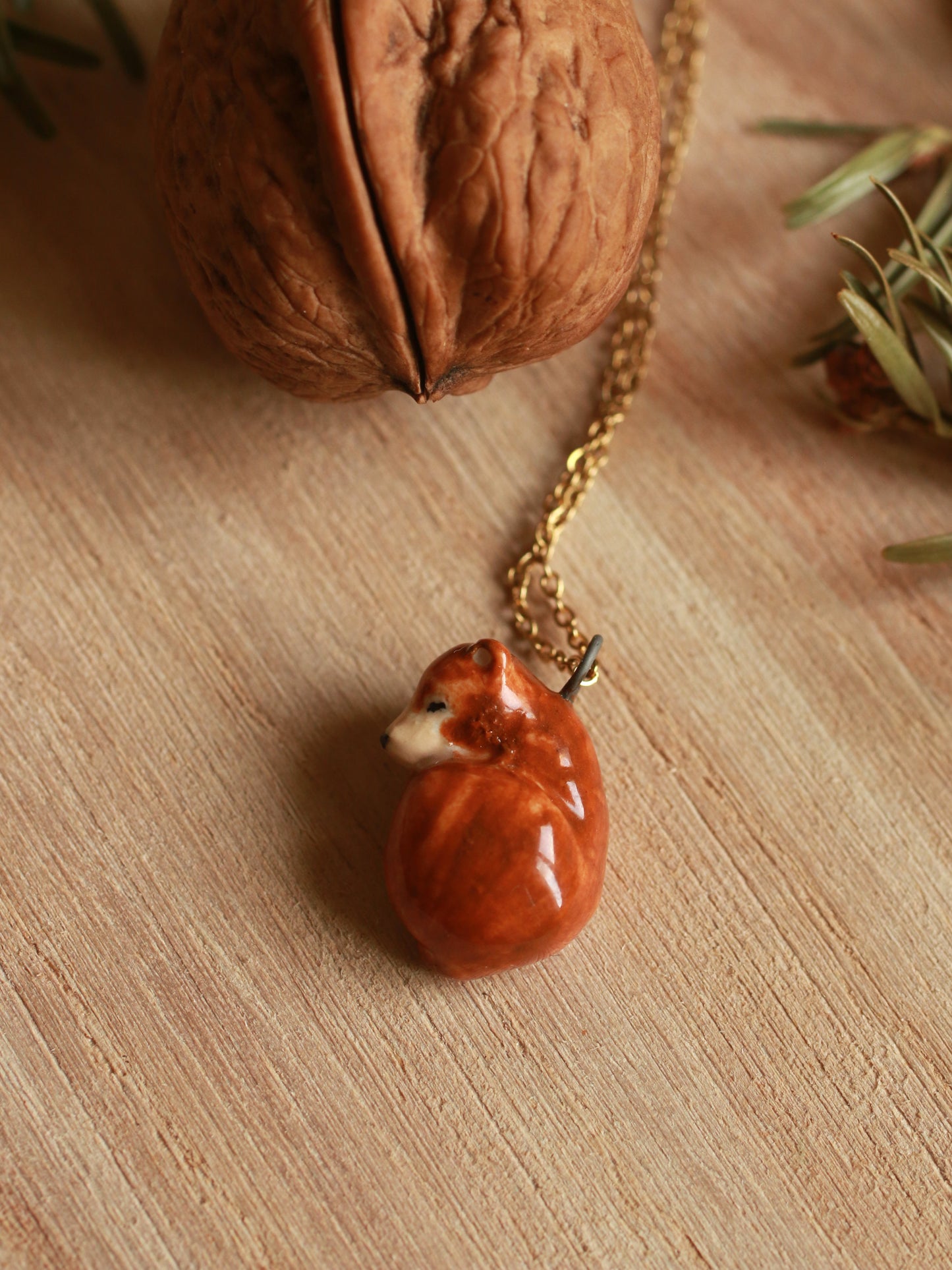 Sleeping bear necklace in a walnut box