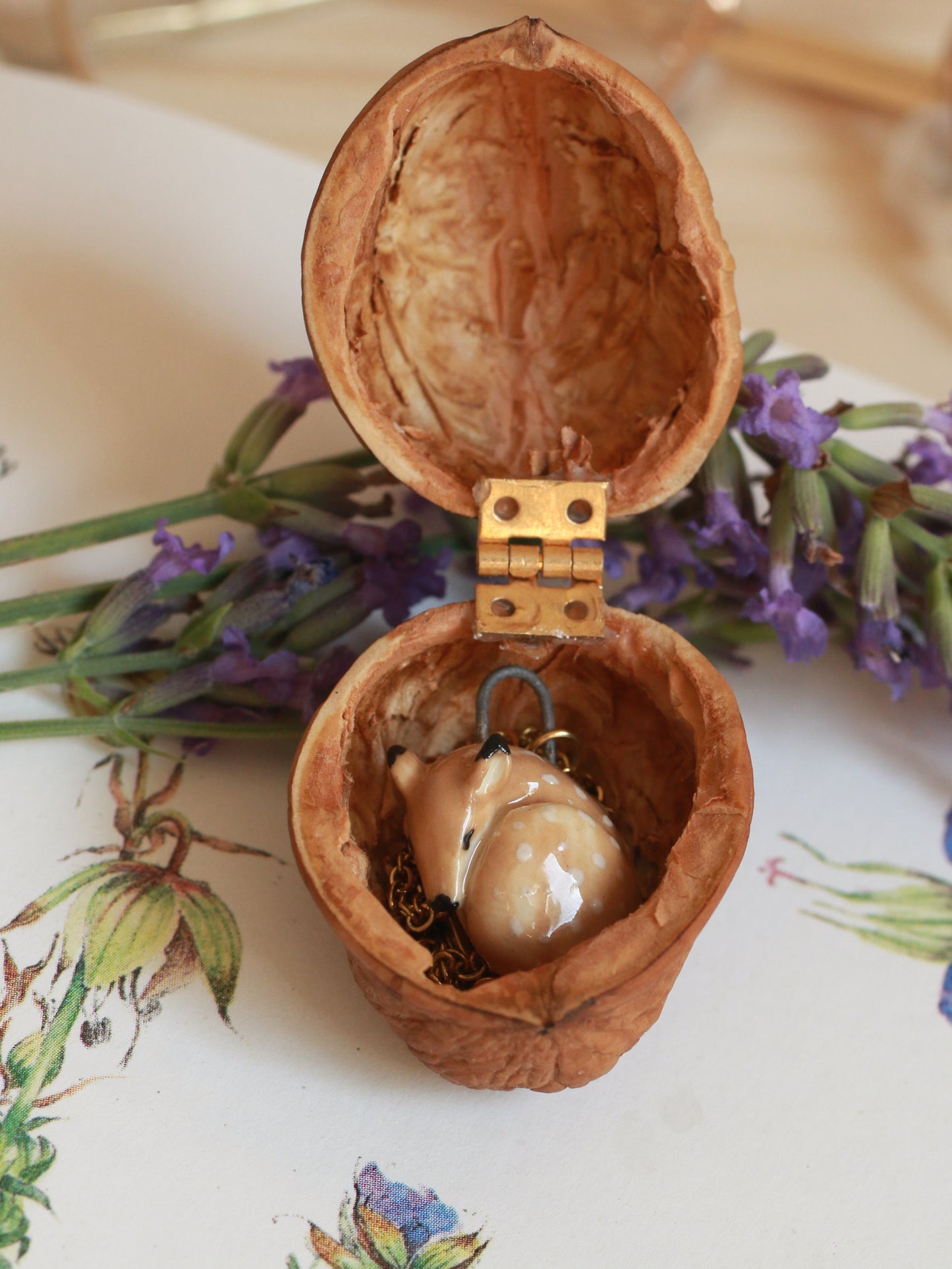 Sleeping Fawn necklace in a walnut box