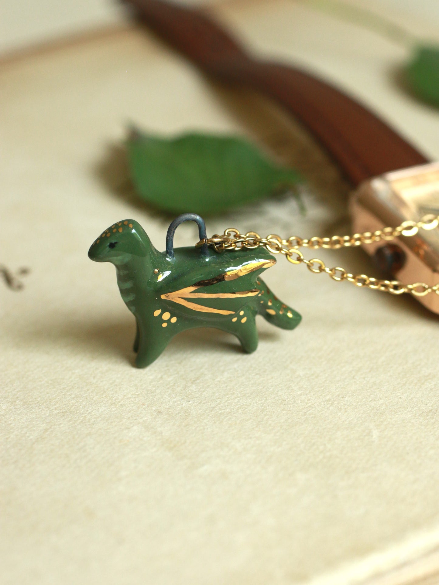 Ceramic dragon necklace - 22k gold details