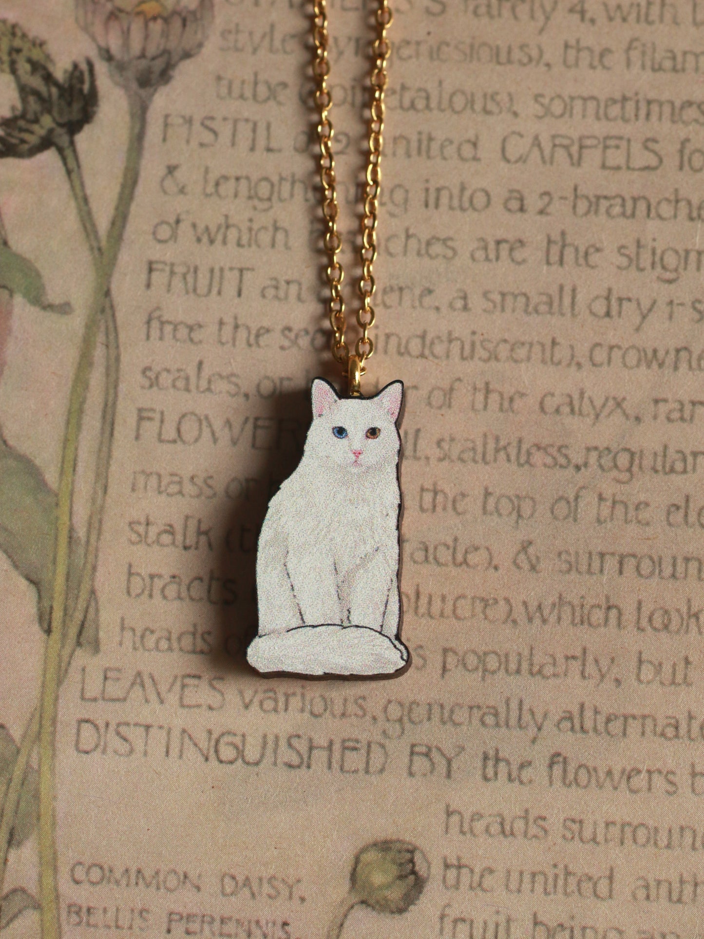 White cat necklace