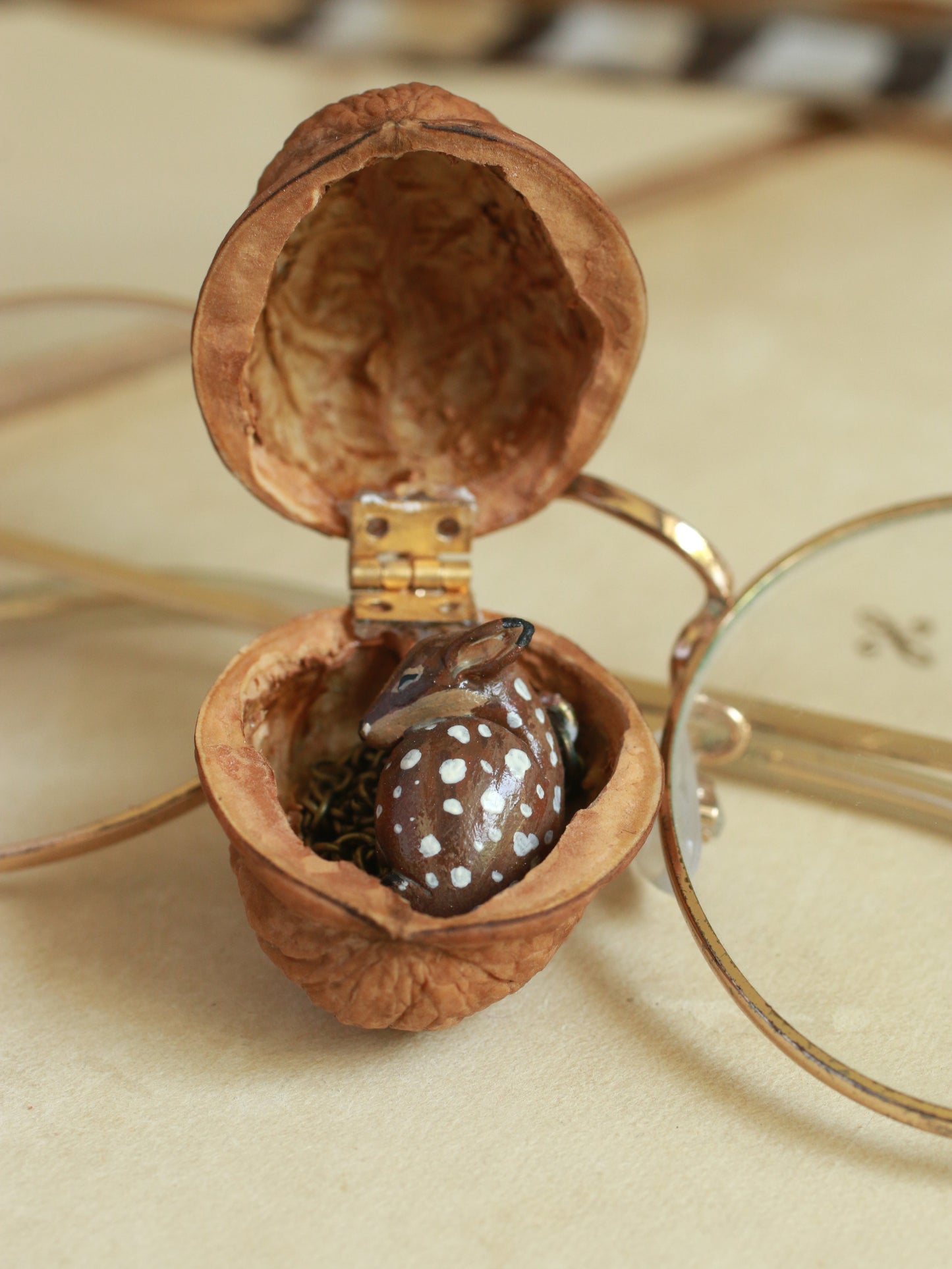 Sleeping Fawn necklace in a walnut box