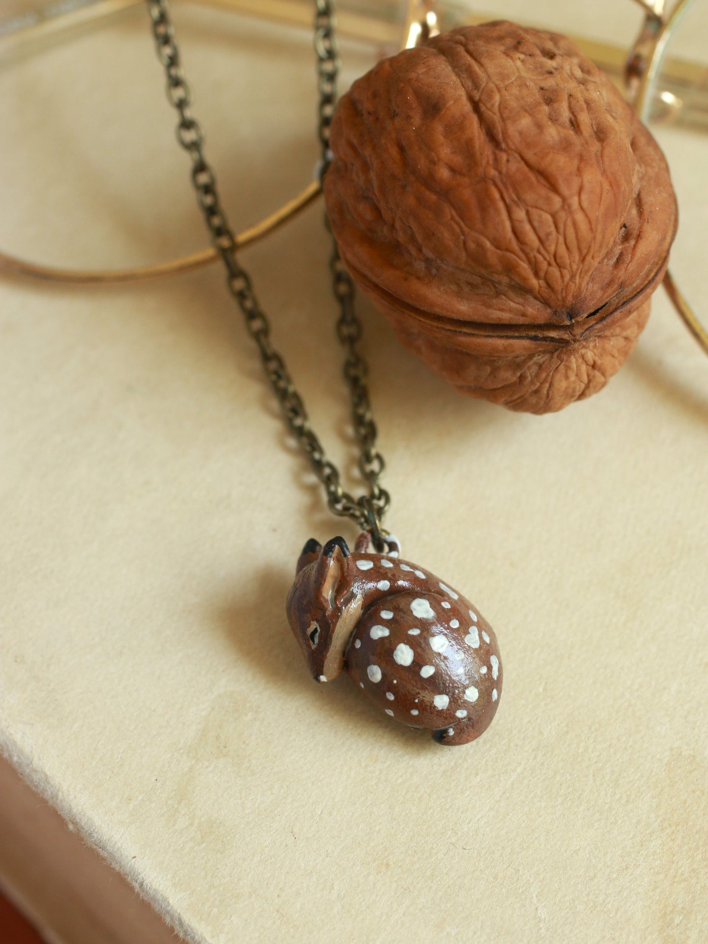 Sleeping Fawn necklace in a walnut box