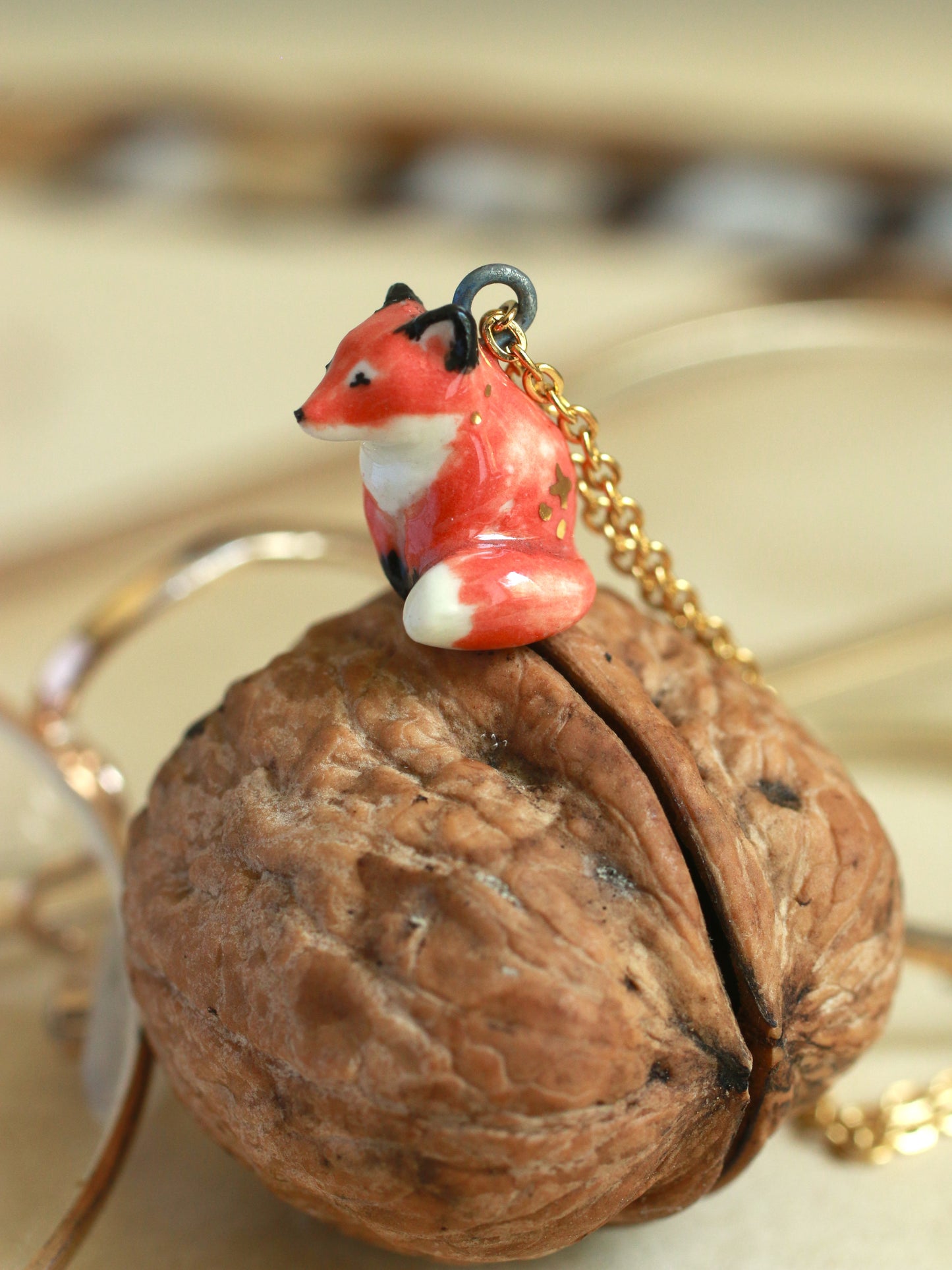 Starry Fox necklace in a walnut box - 22k gold details