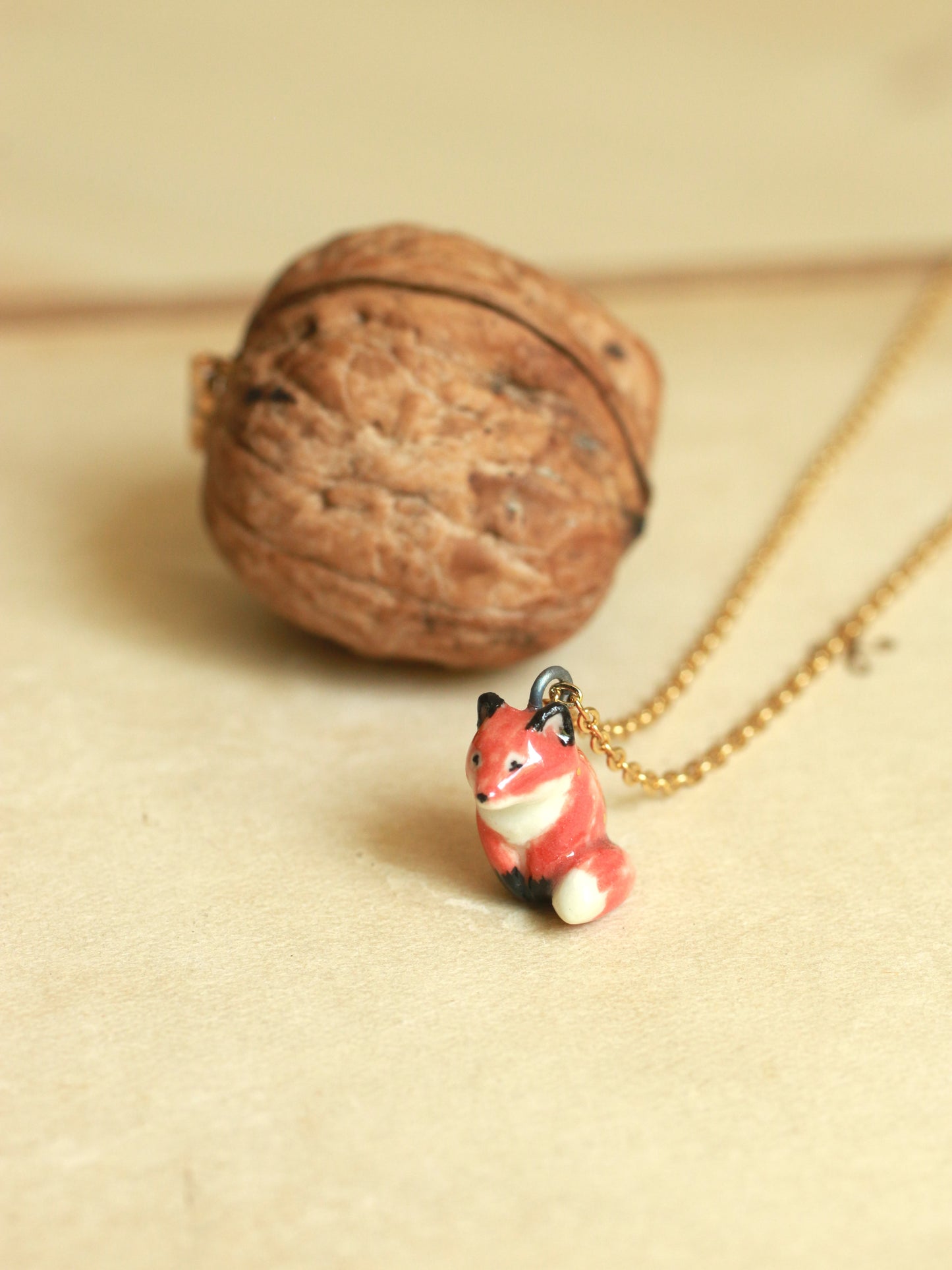 Starry Fox necklace in a walnut box - 22k gold details