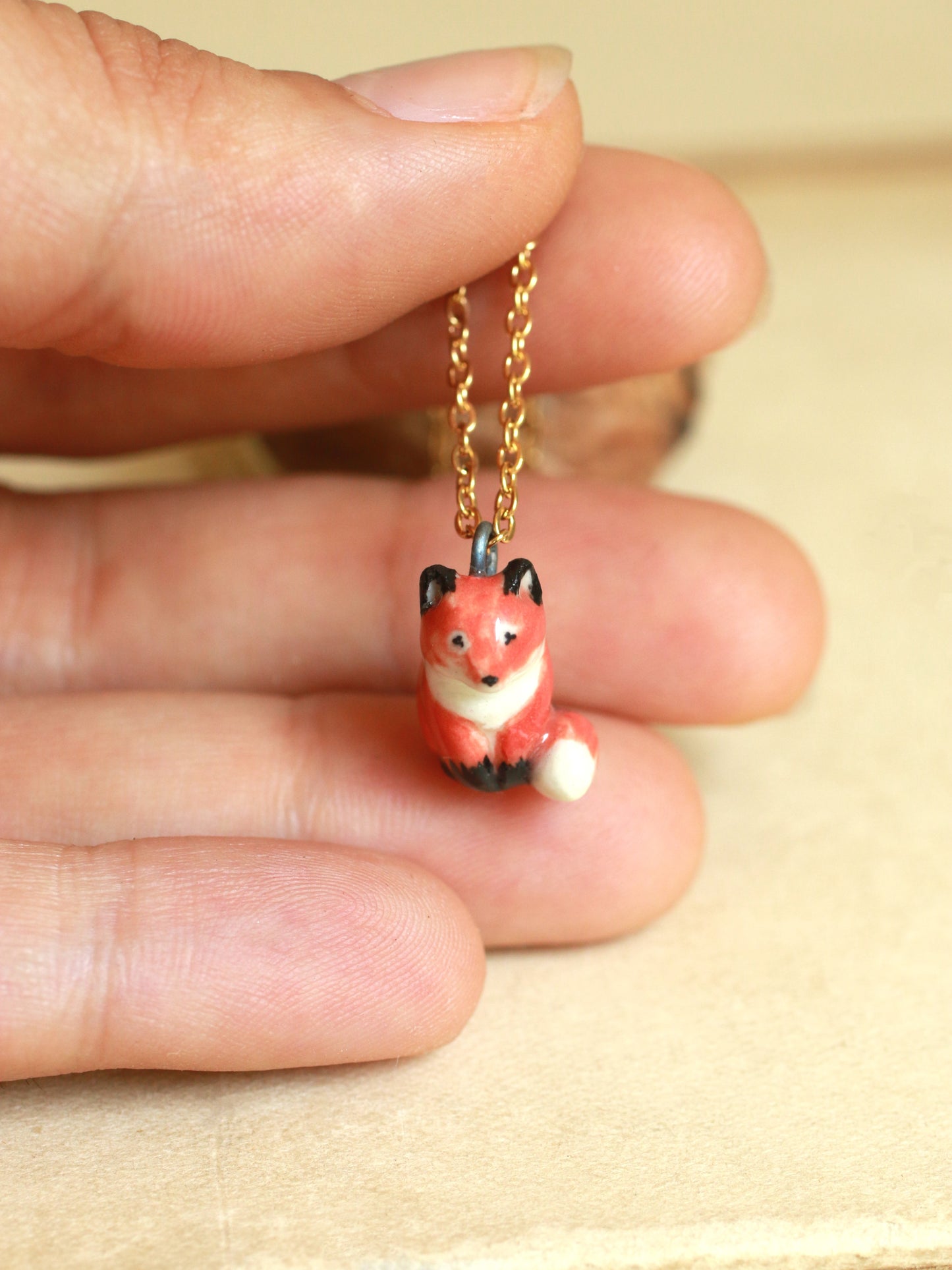 Starry Fox necklace in a walnut box - 22k gold details