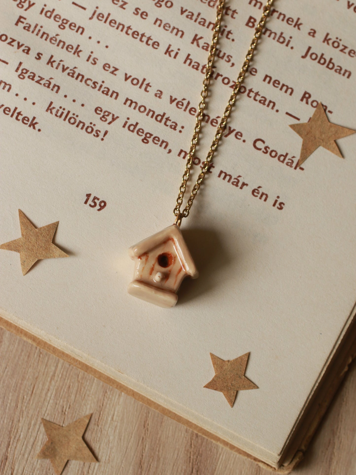 Bird house necklace