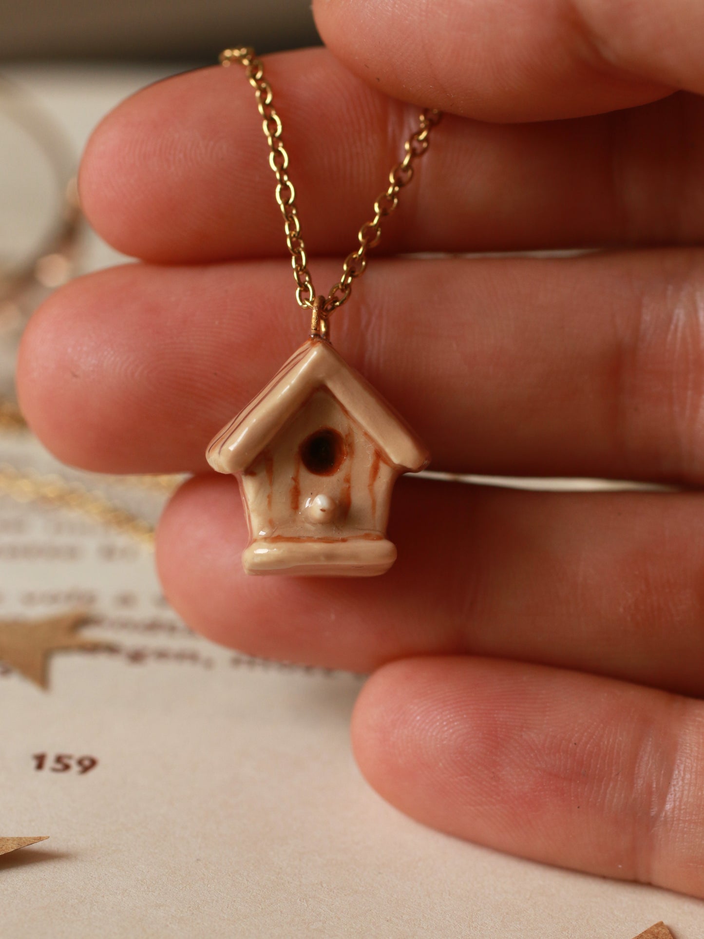 Bird house necklace