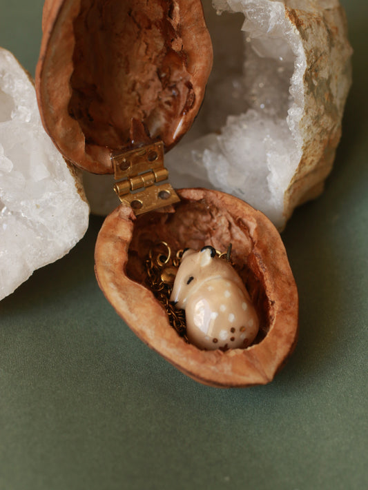 Sleeping Fawn necklace in a walnut box