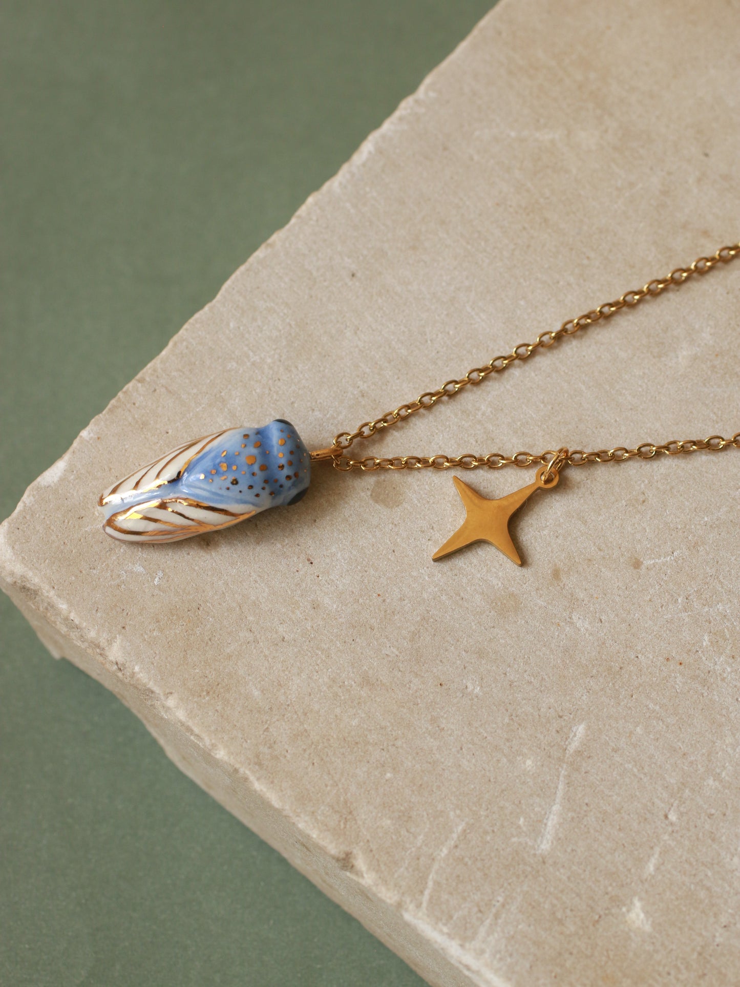 Blue cicada necklace