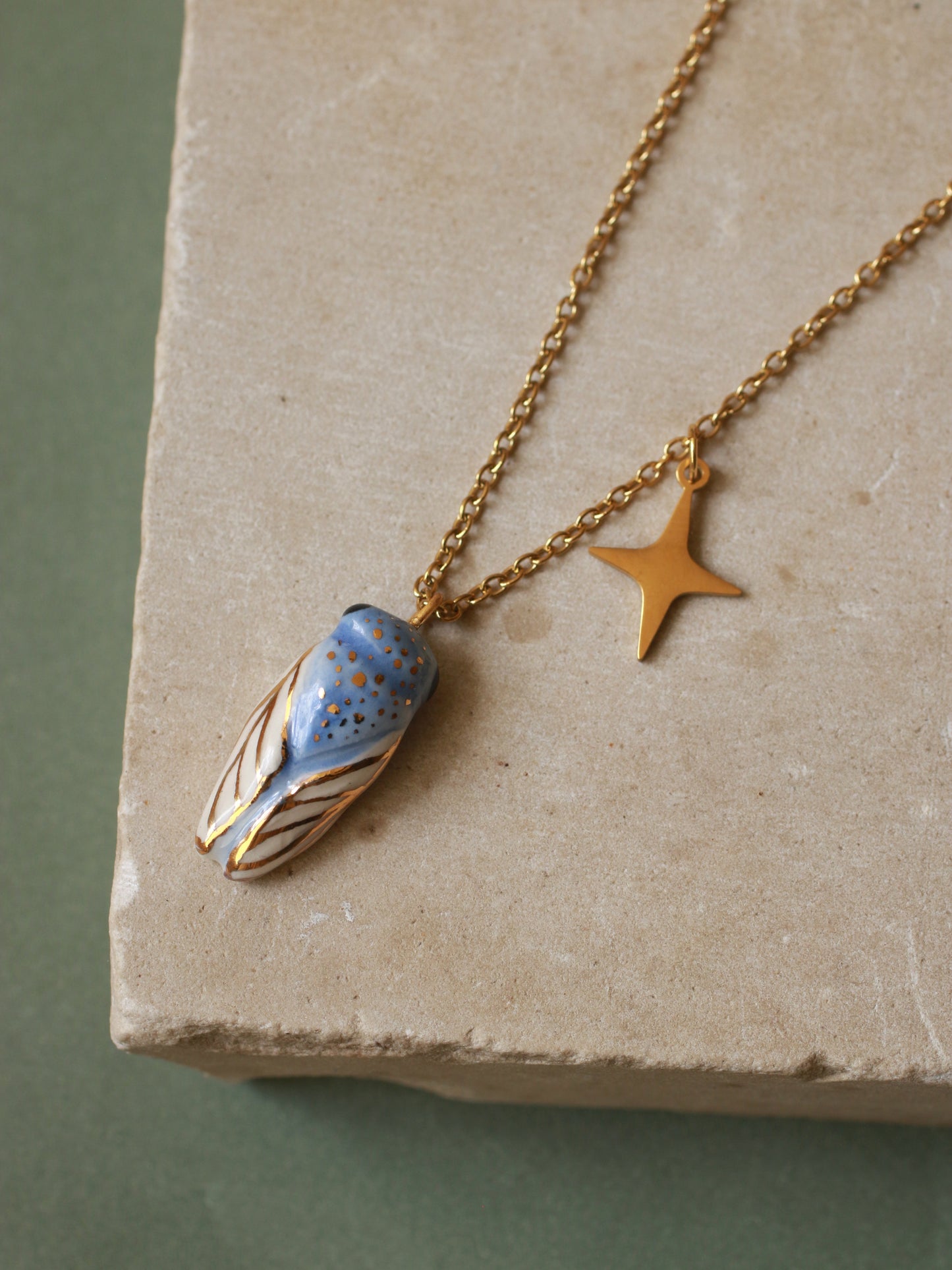 Blue cicada necklace