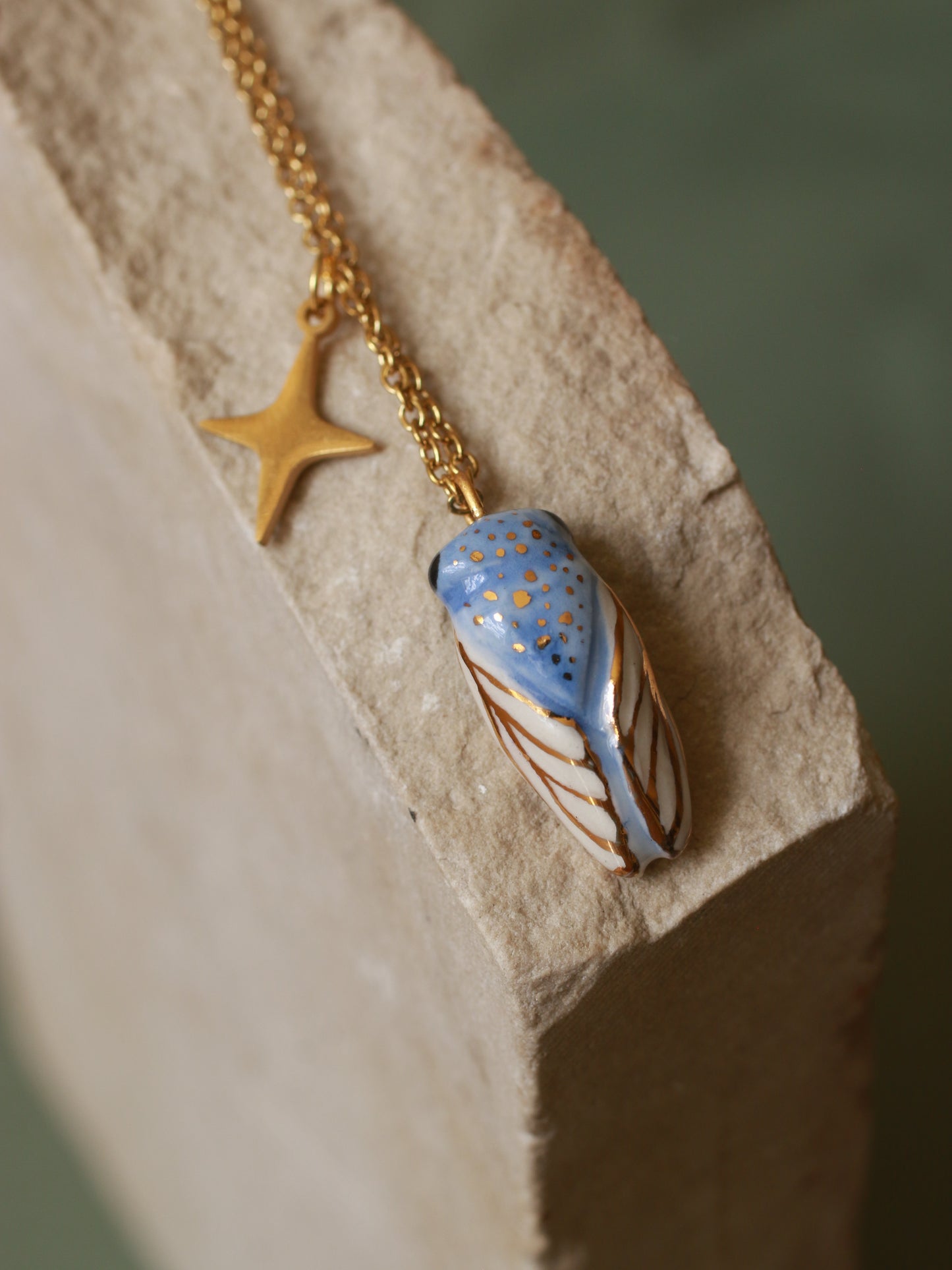 Blue cicada necklace