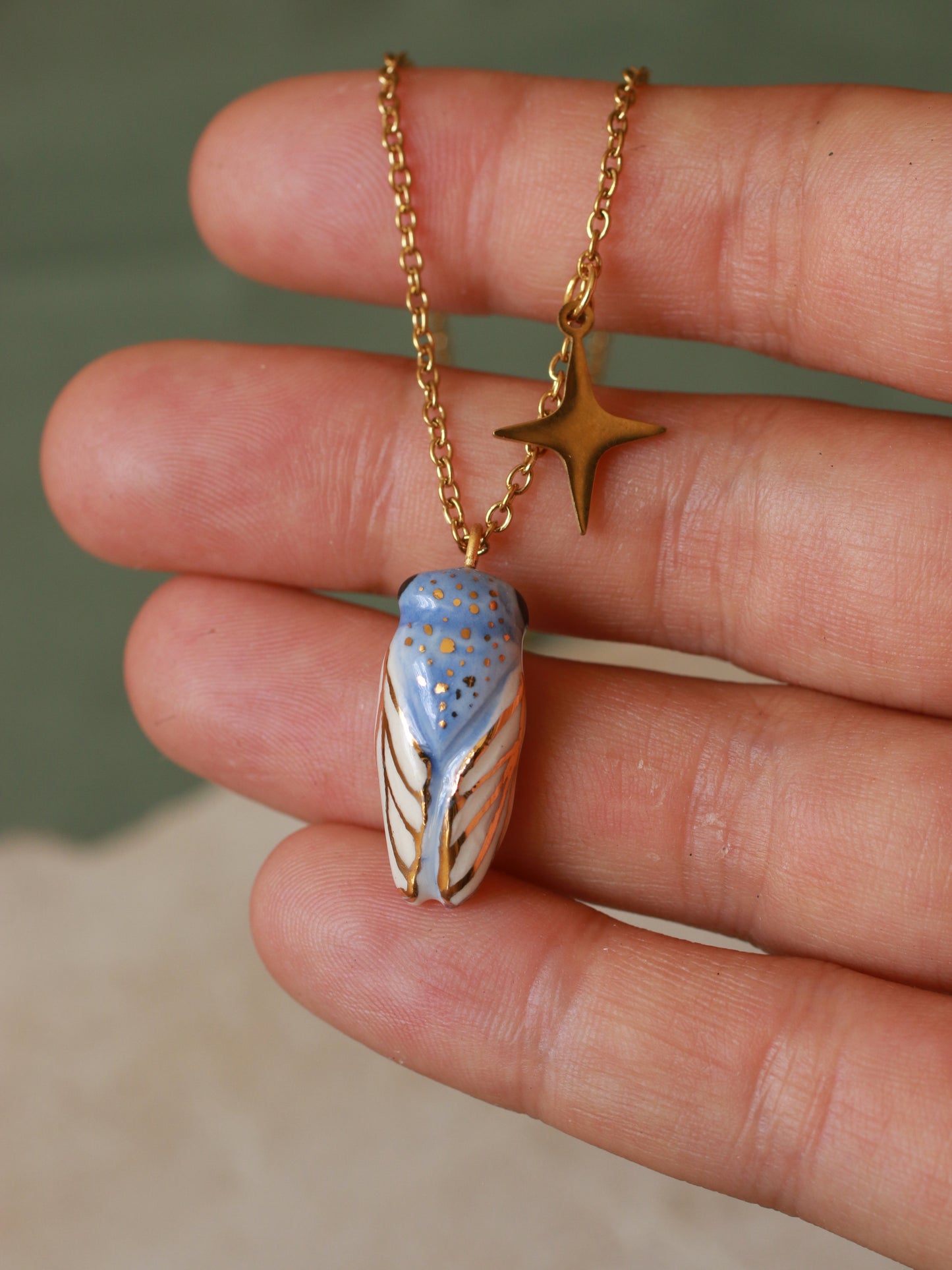 Blue cicada necklace