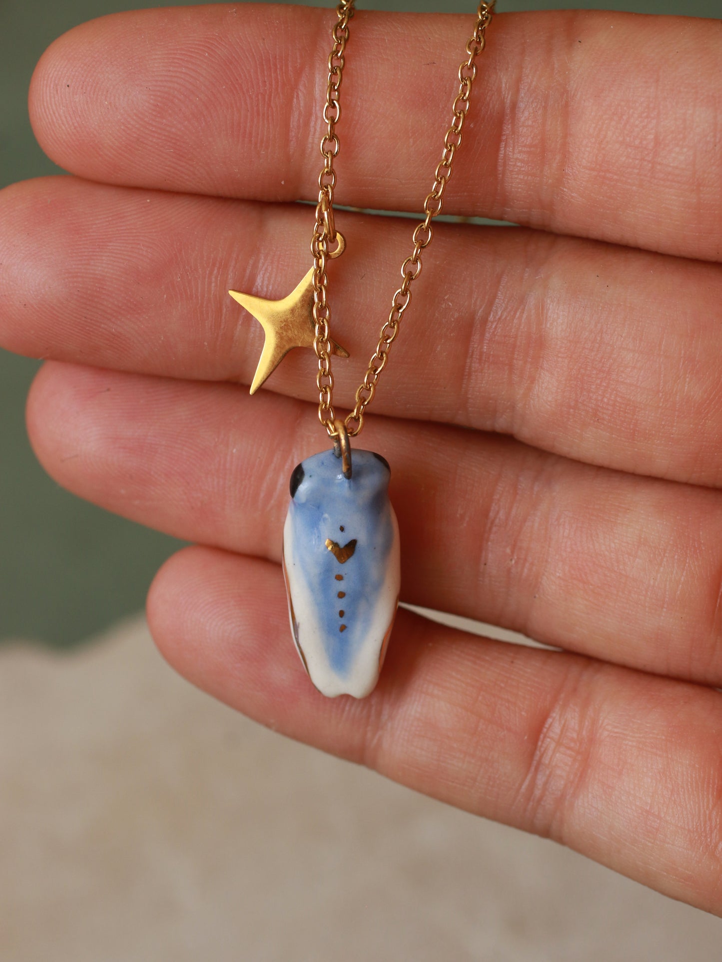 Blue cicada necklace