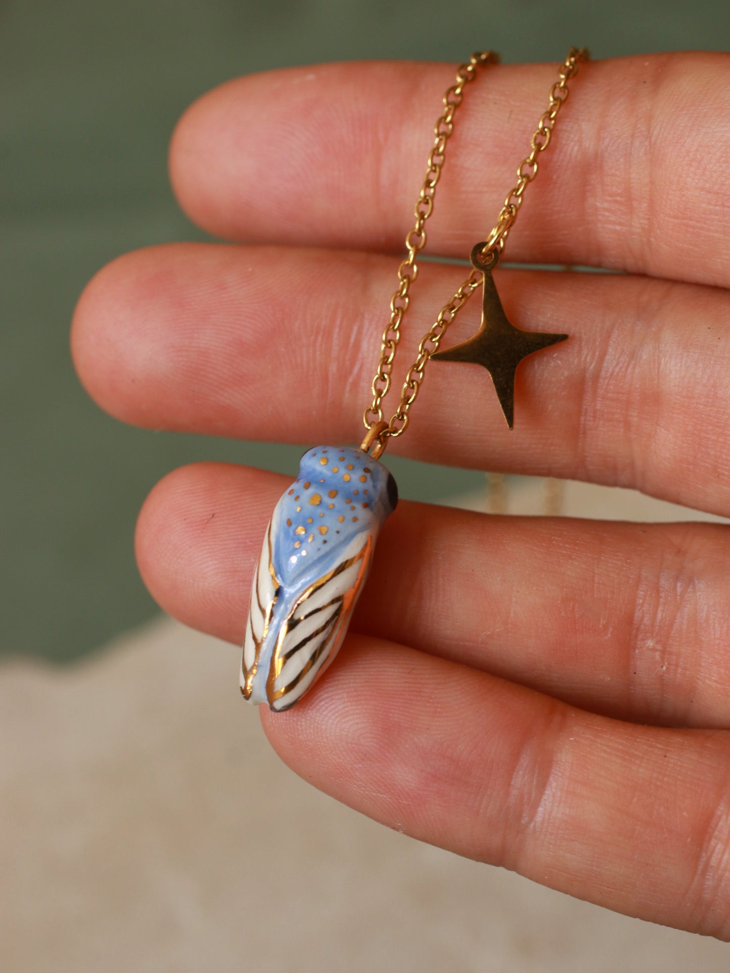 Blue cicada necklace