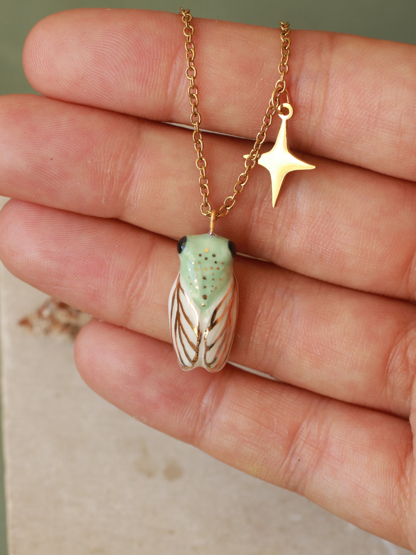 Green cicada necklace