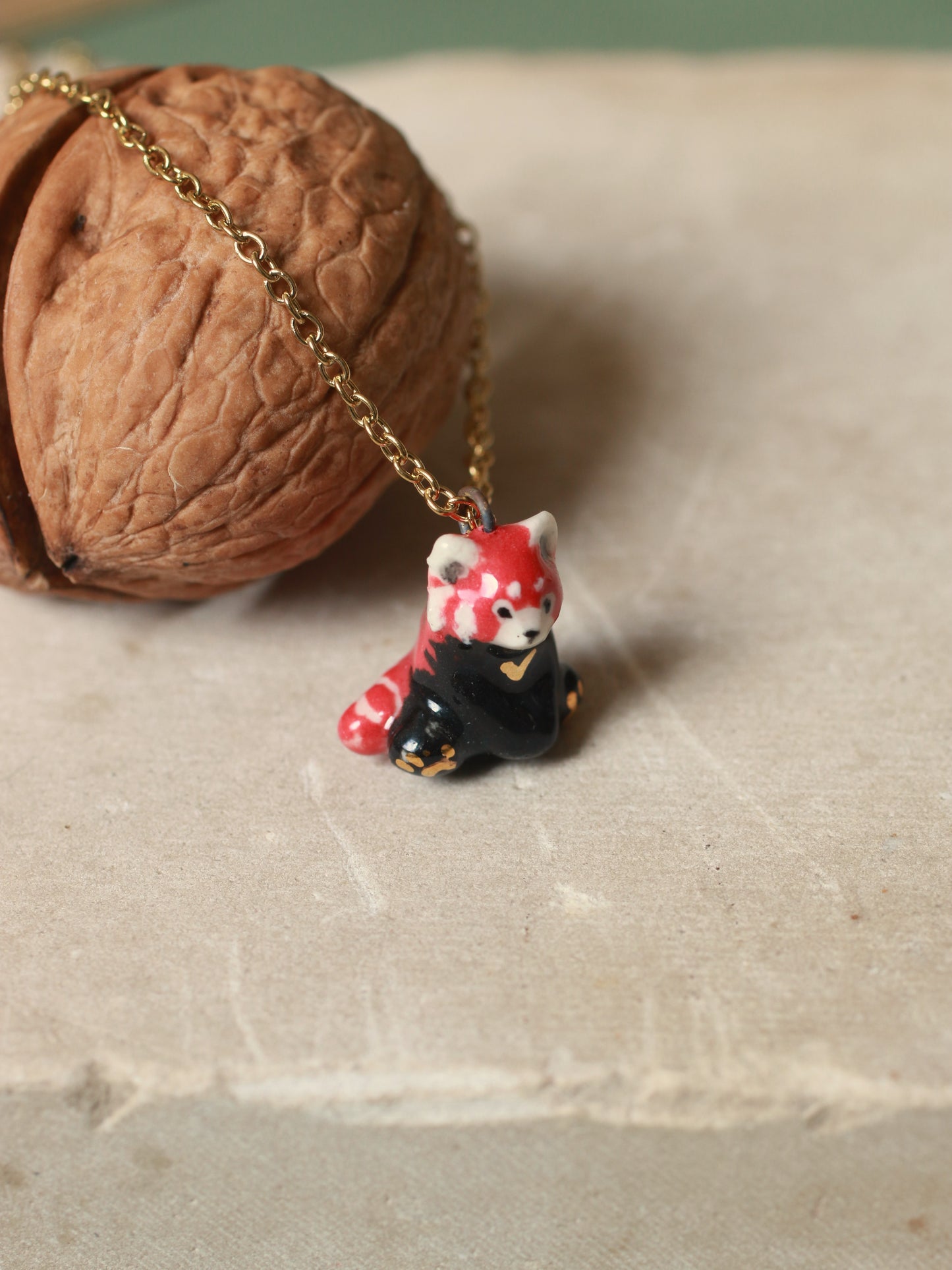 Red Panda necklace in a walnut box