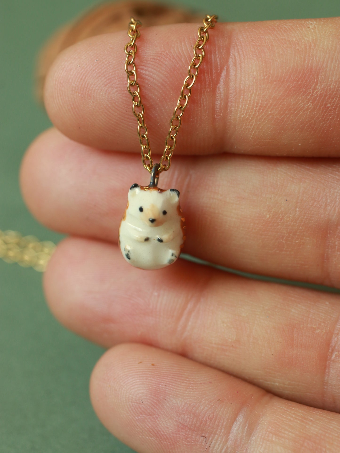 Hedgehog necklace in a walnut box