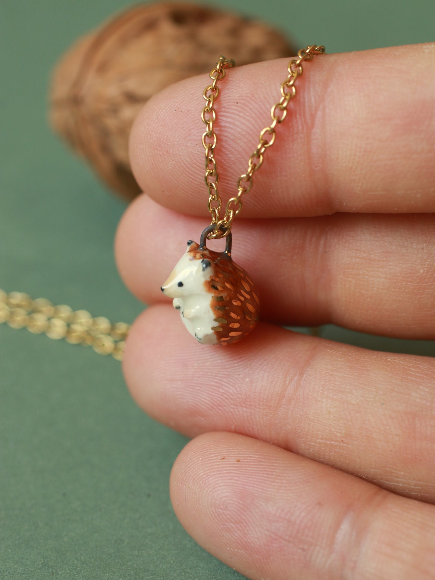 Hedgehog necklace in a walnut box