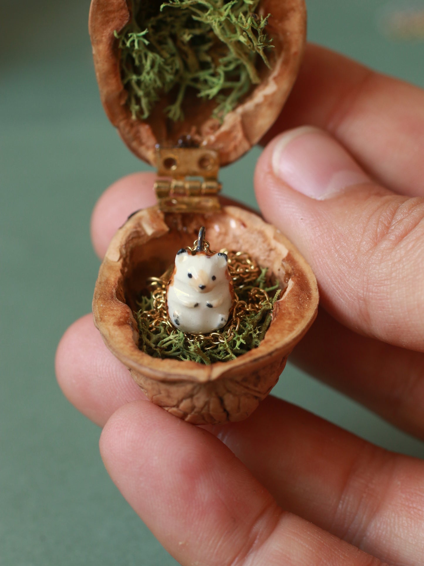 Hedgehog necklace in a walnut box