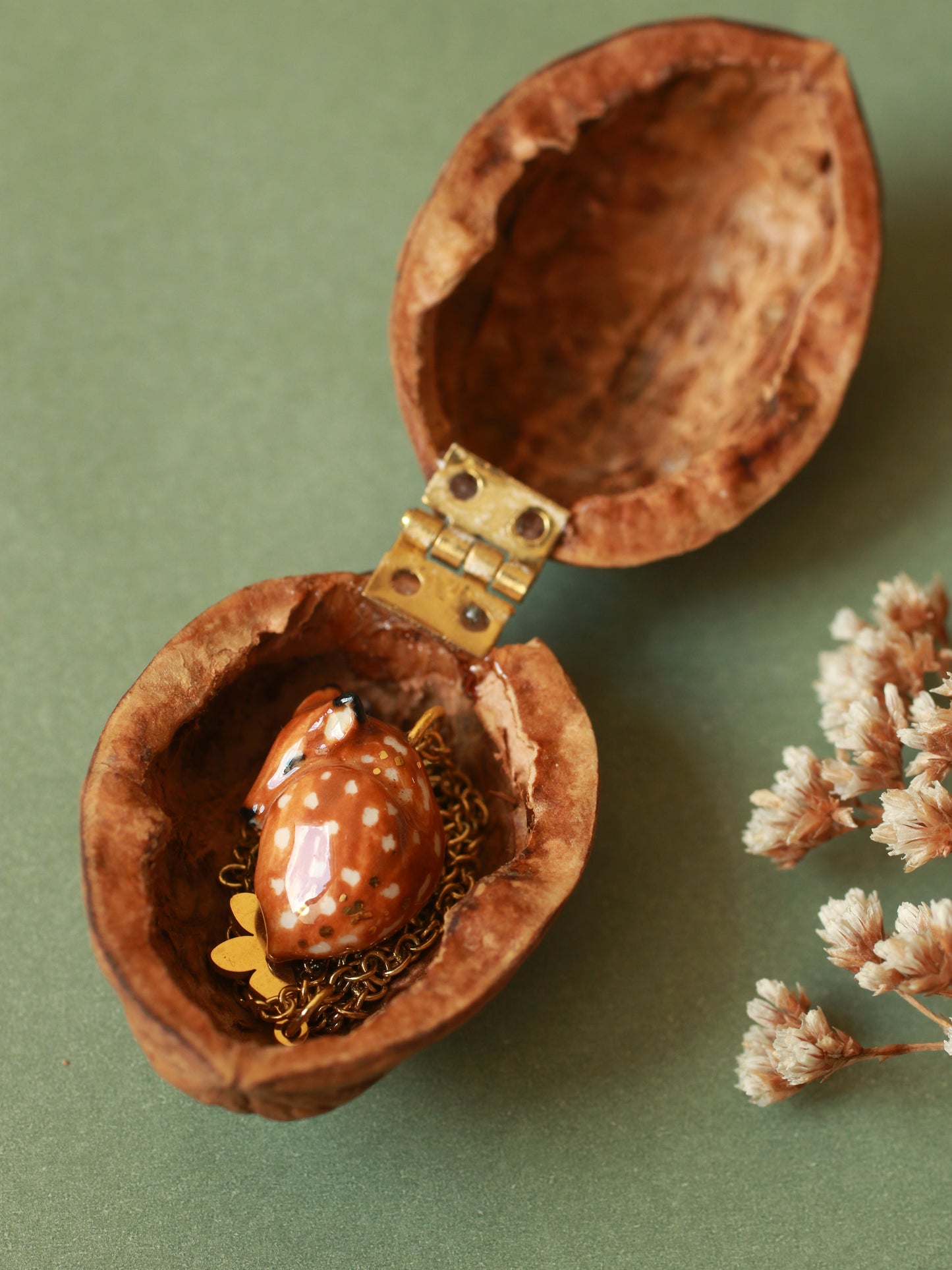 Sleeping Fawn necklace in a walnut box