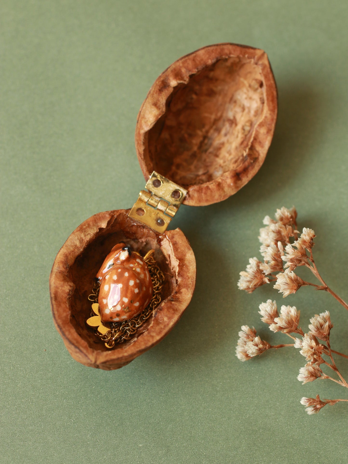 Sleeping Fawn necklace in a walnut box