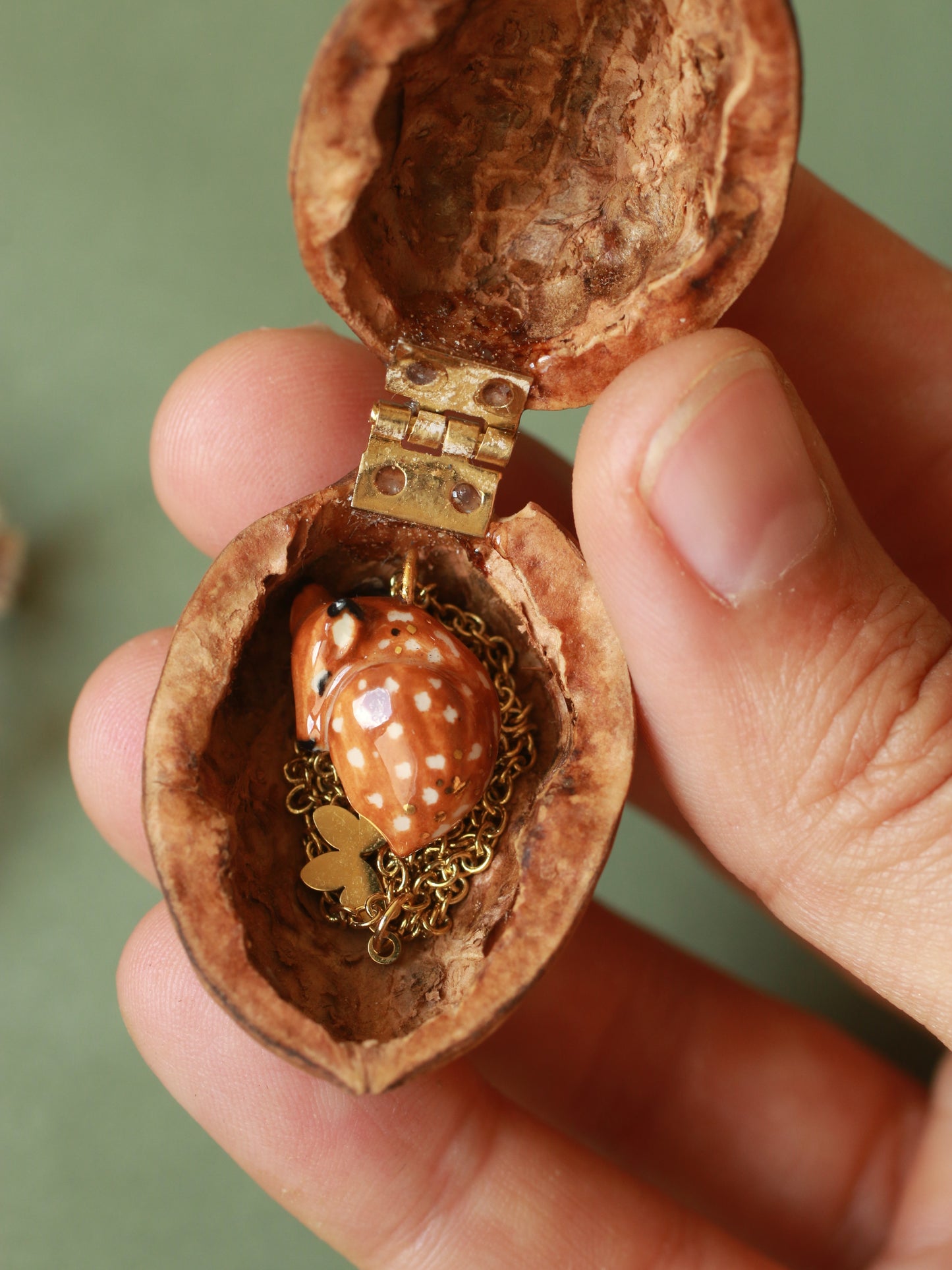Sleeping Fawn necklace in a walnut box