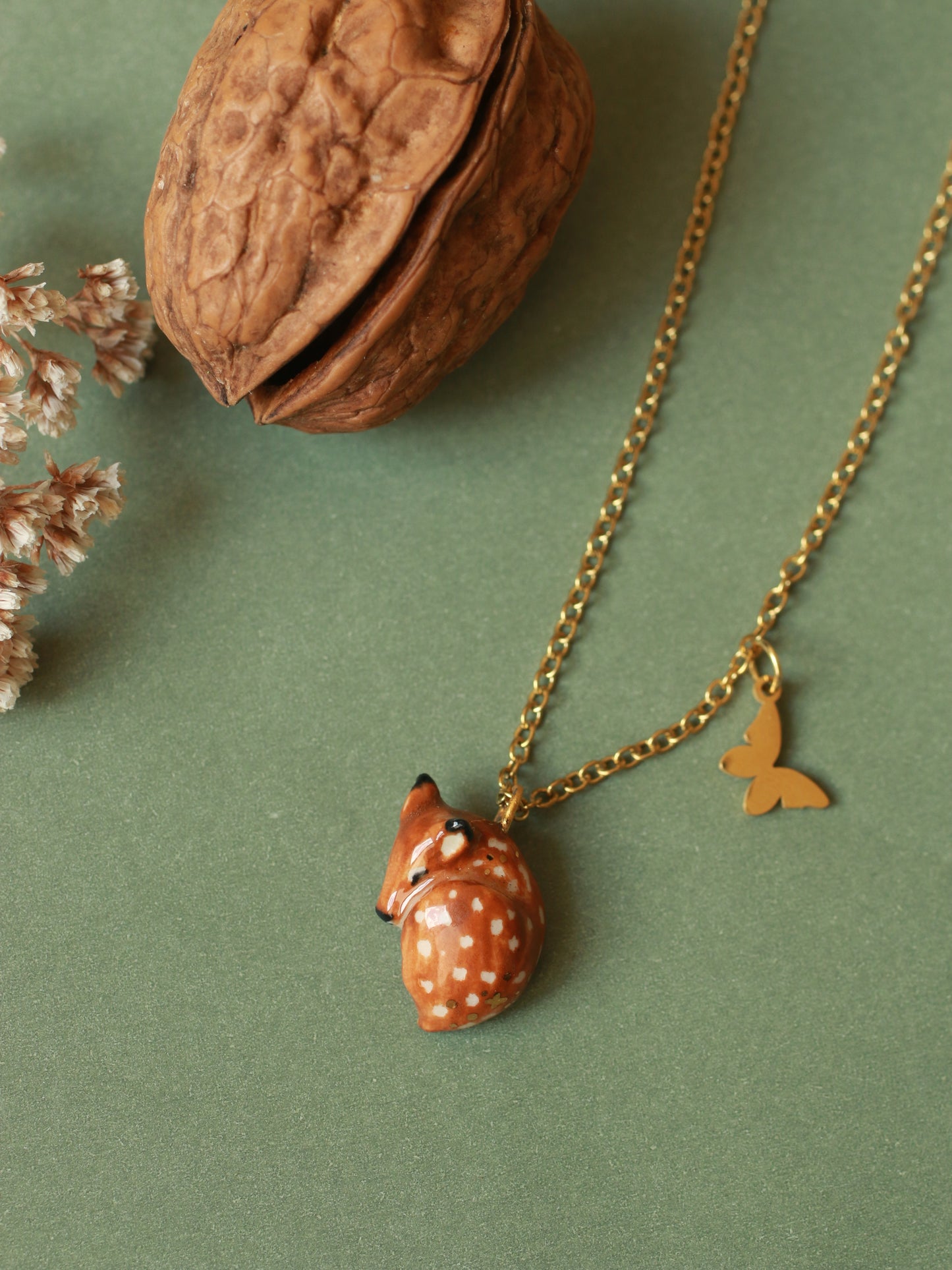 Sleeping Fawn necklace in a walnut box