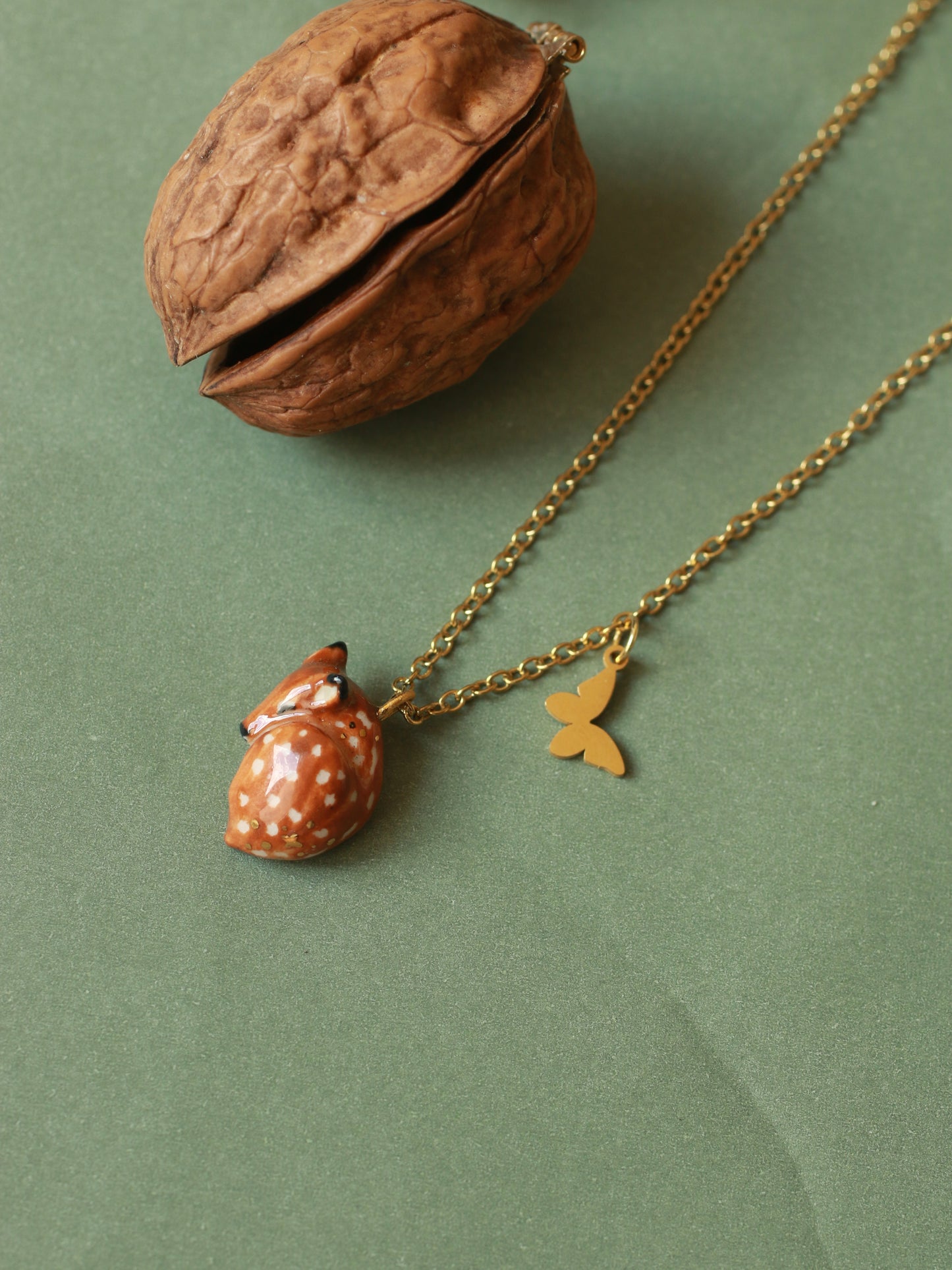Sleeping Fawn necklace in a walnut box