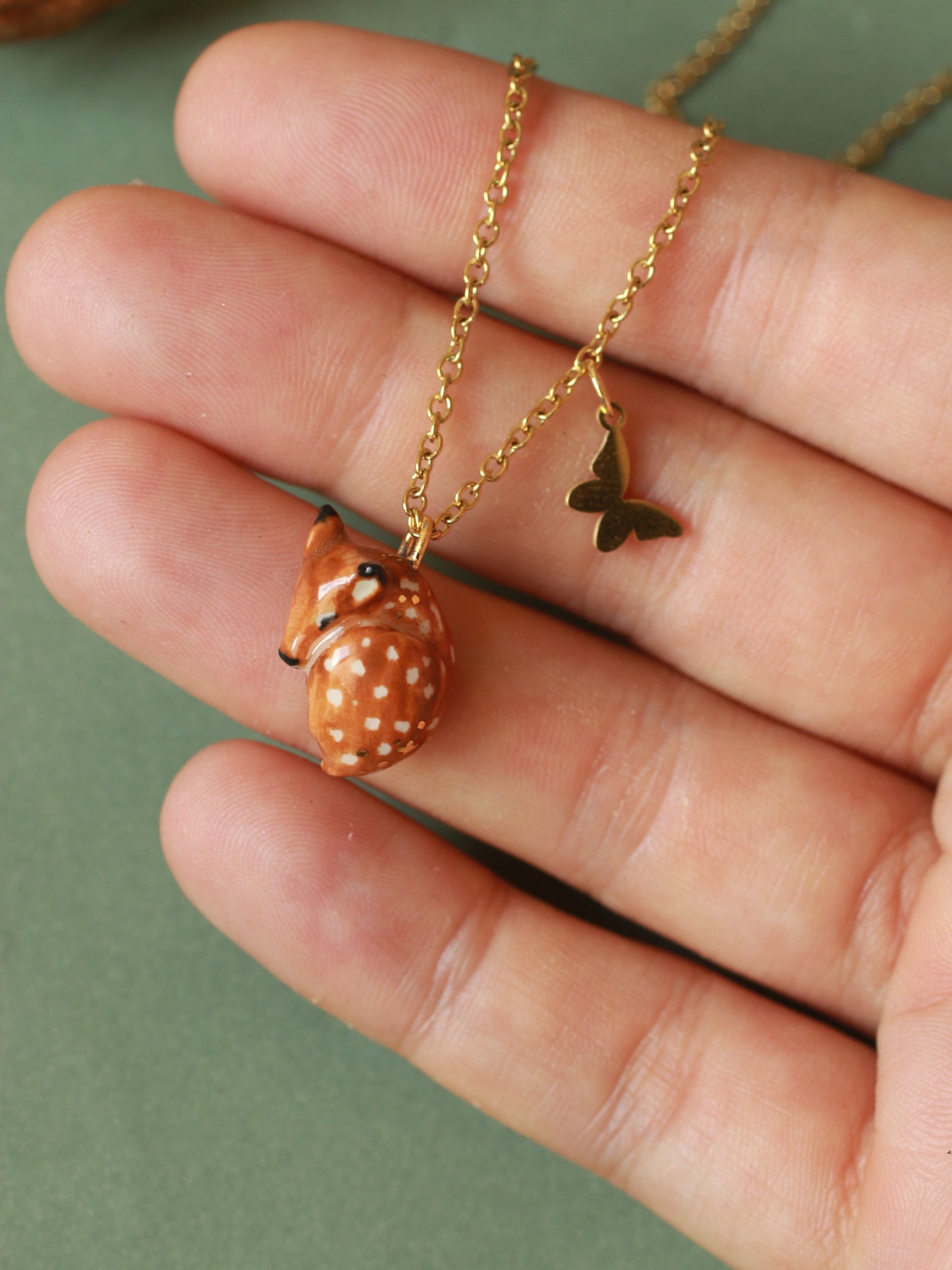 Sleeping Fawn necklace in a walnut box