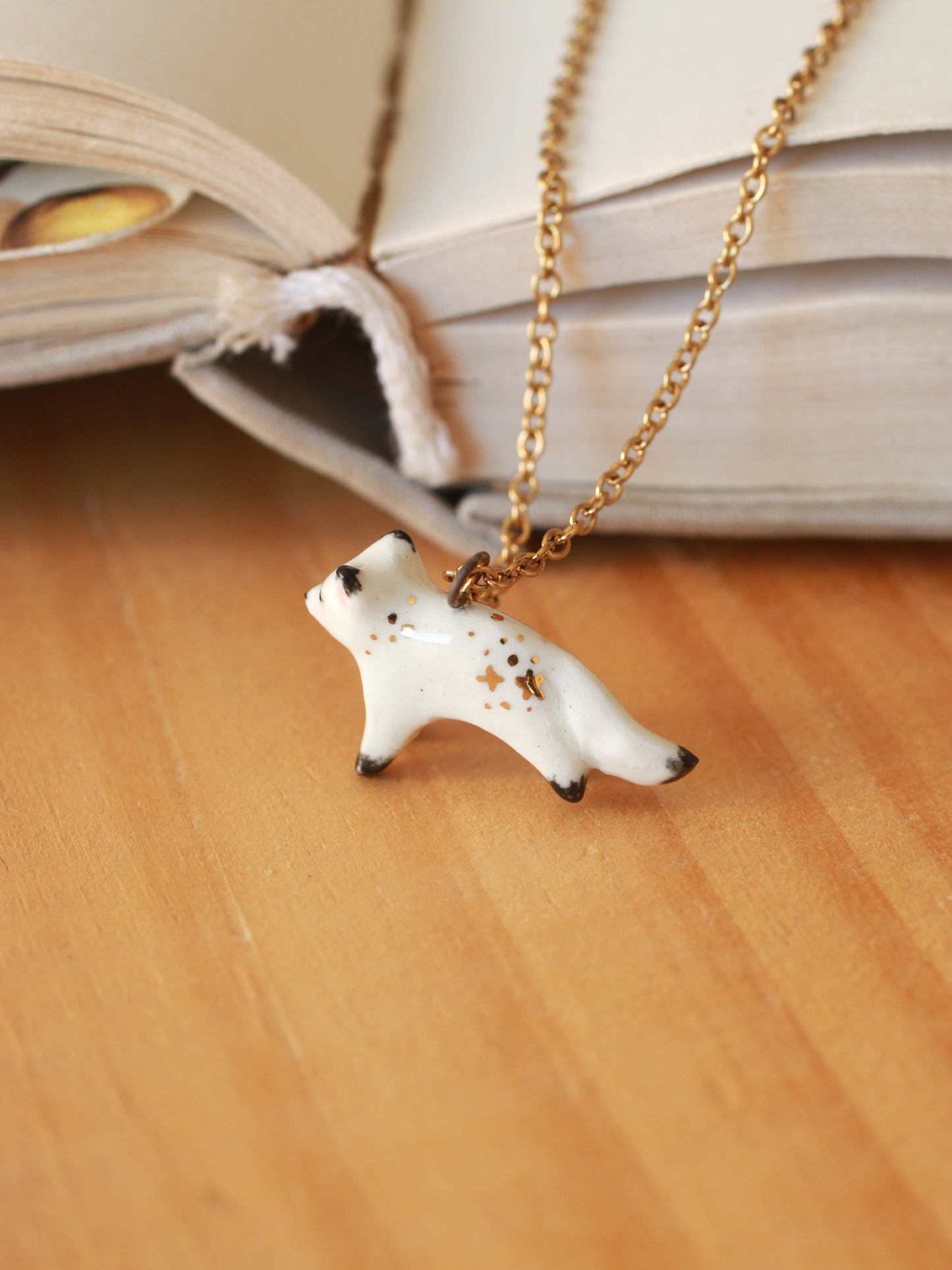 Starry arctic fox necklace