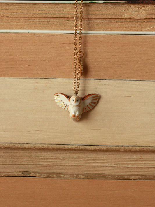 Barn owl necklace with a feather charm