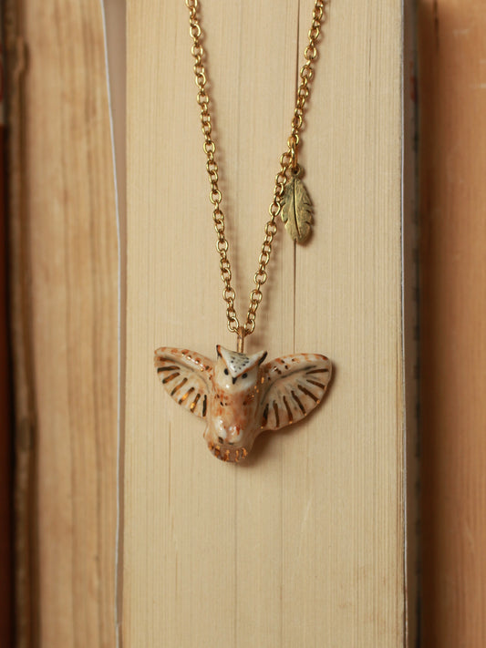 Eagle owl necklace with a feather charm