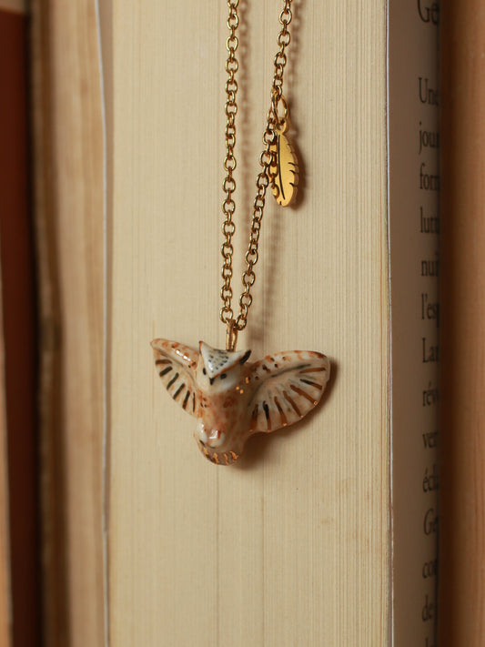 Eagle owl necklace with a feather charm