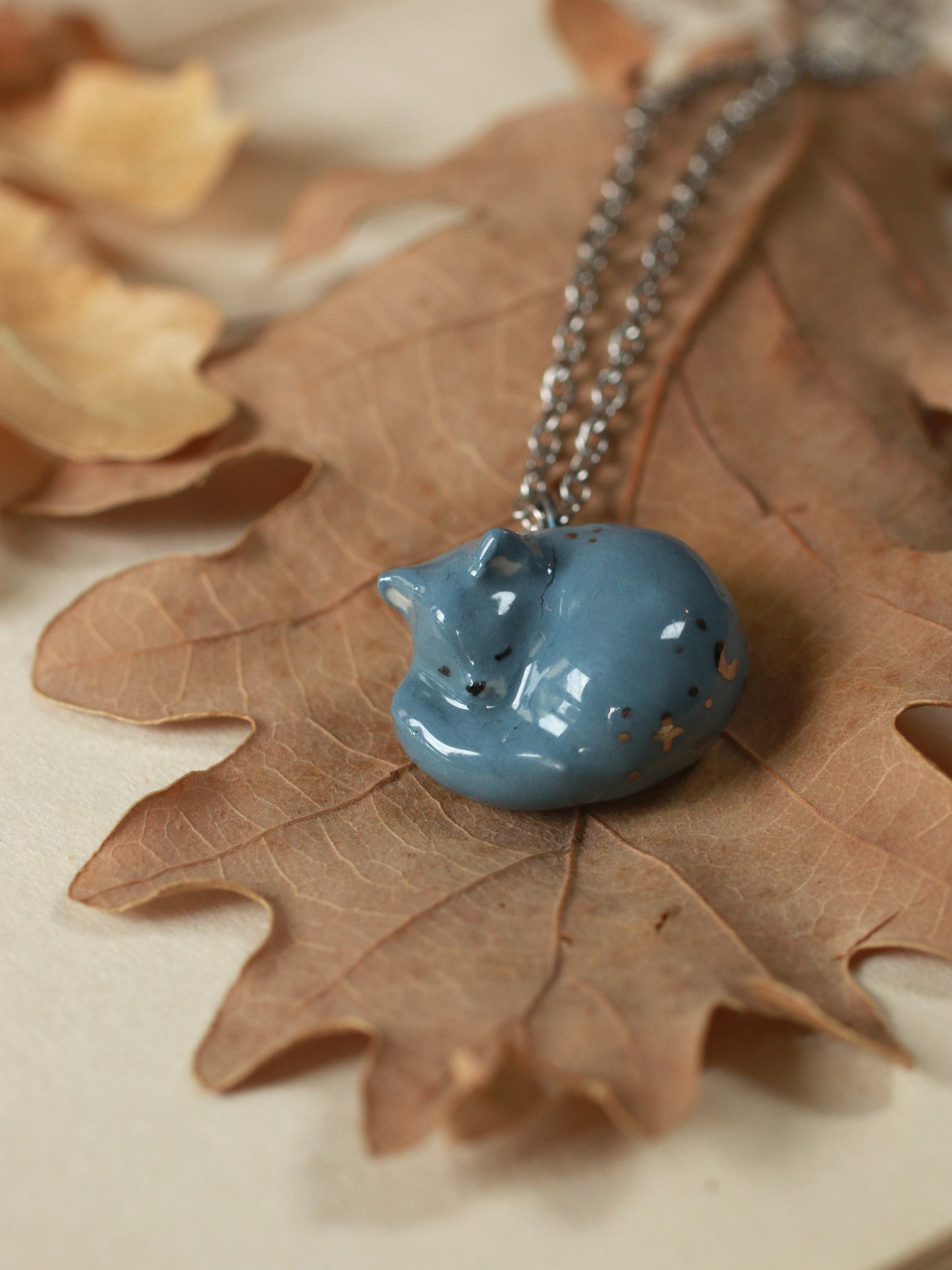 Sleeping grey cat necklace